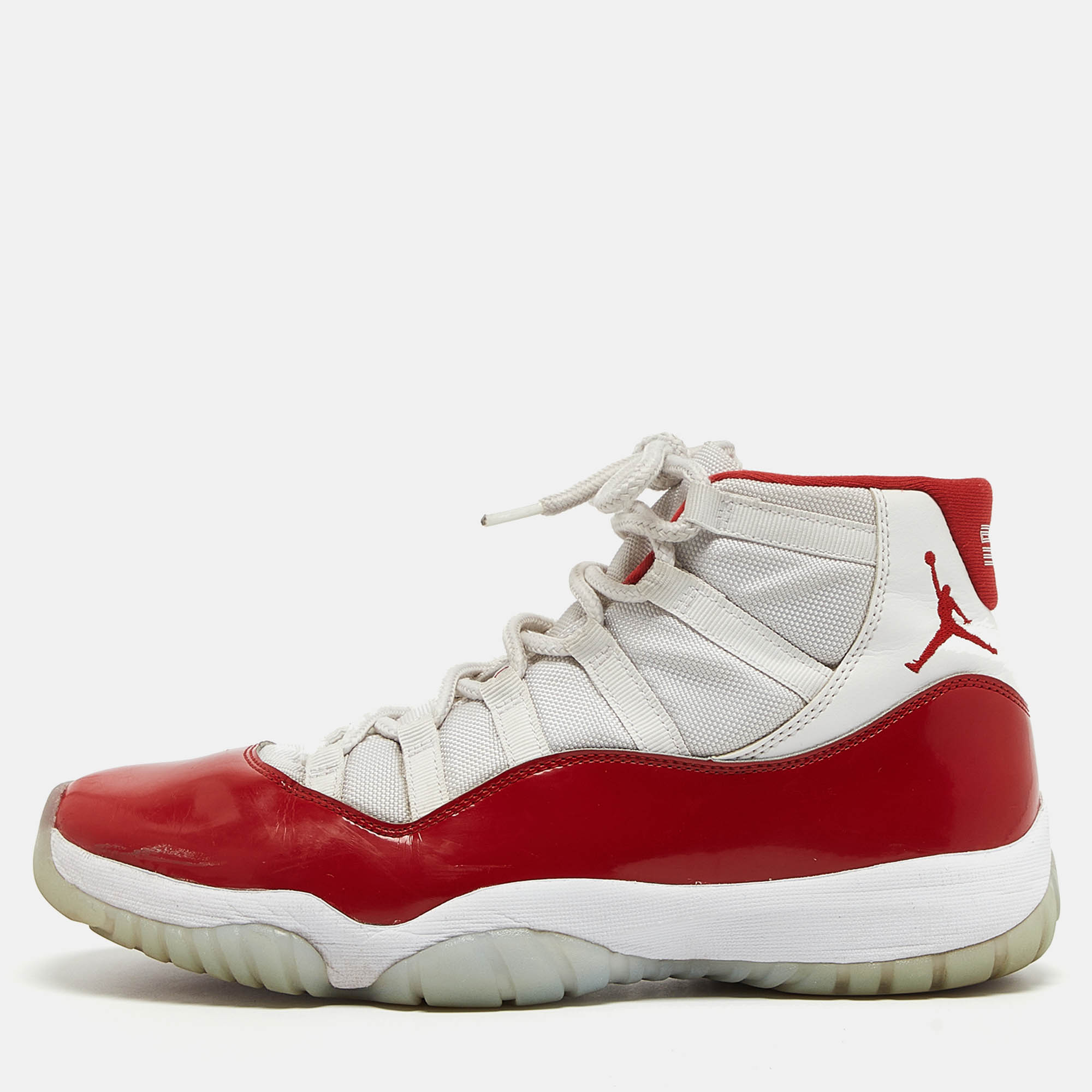 

Air Jordans White/Red Canvas And Leather Jordan 11 Retro High Sneakers Size