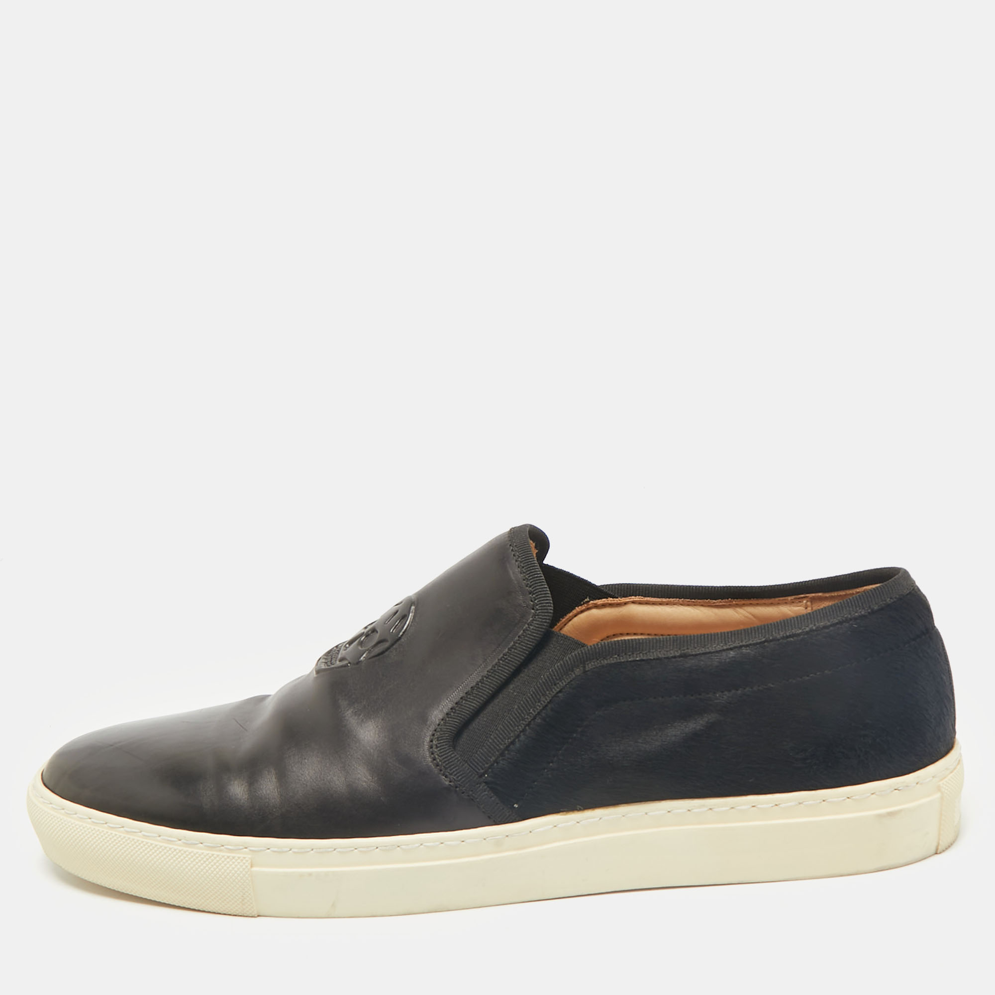 Alexander McQueen Black Leather and Calf Hair Skull Logo Embossed Slip On Sneakers Size
Alexander McQueen Black Leather and Calf Hair Skull Logo Embossed Slip On Sneakers Size