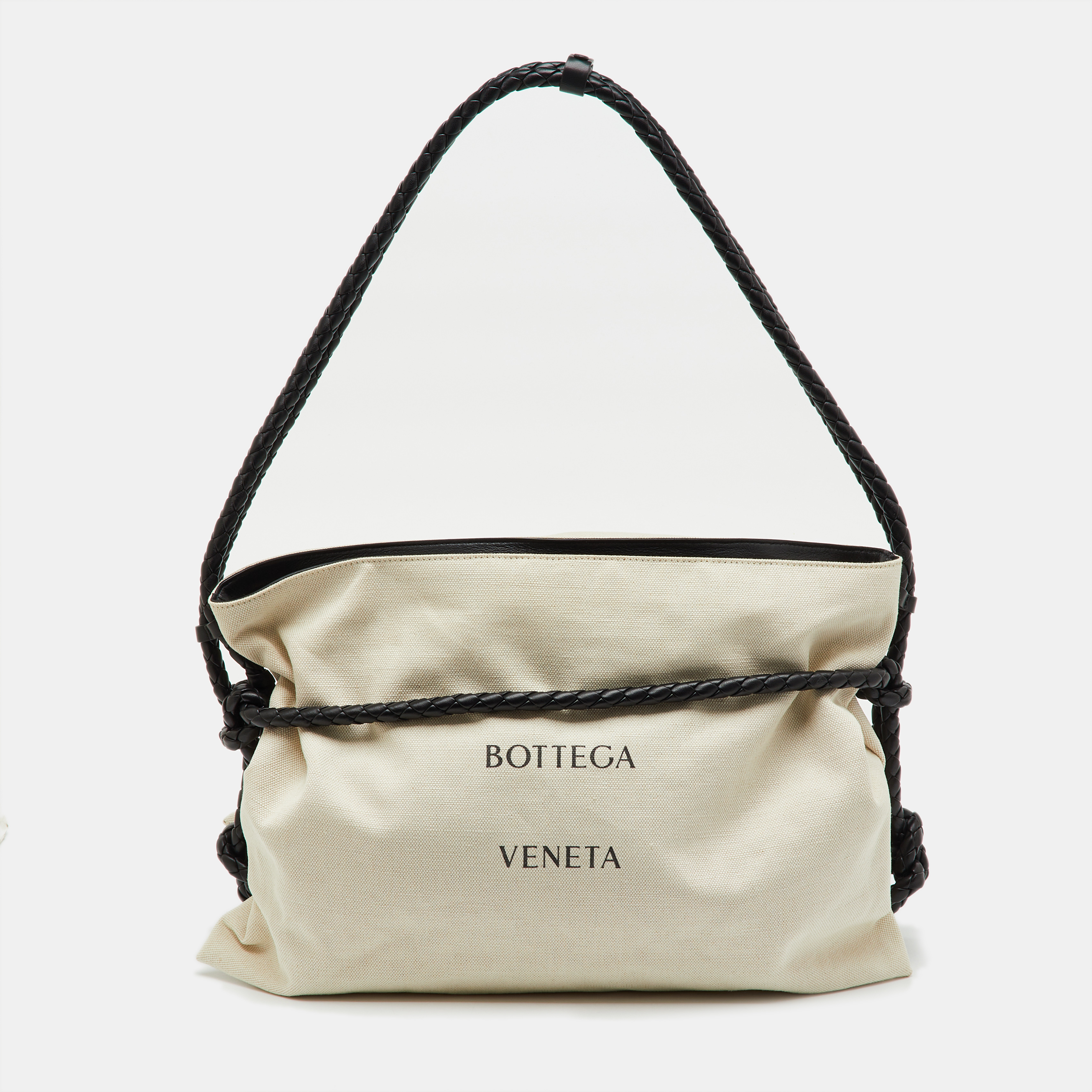 Bottega Veneta Beige/Black Canvas and Leather Quadronno Bag
Bottega Veneta Beige/Black Canvas and Leather Quadronno Bag