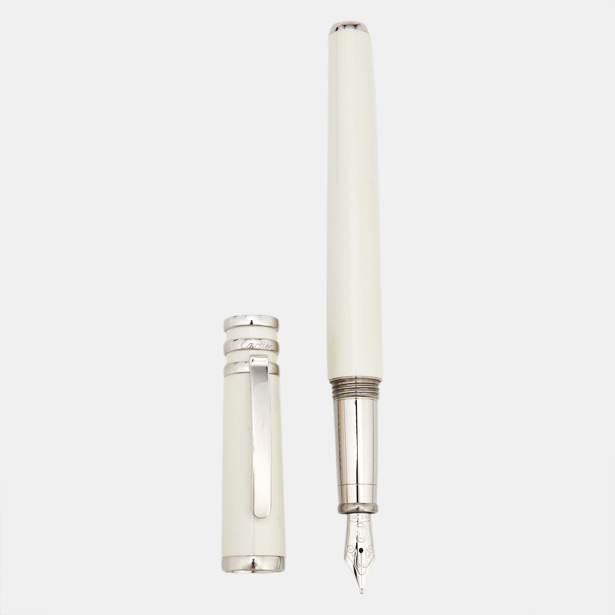 Cartier Trinity Mother of Pearl Lacquer Silver Tone Fountain Pen
Cartier Trinity Mother of Pearl Lacquer Silver Tone Fountain Pen