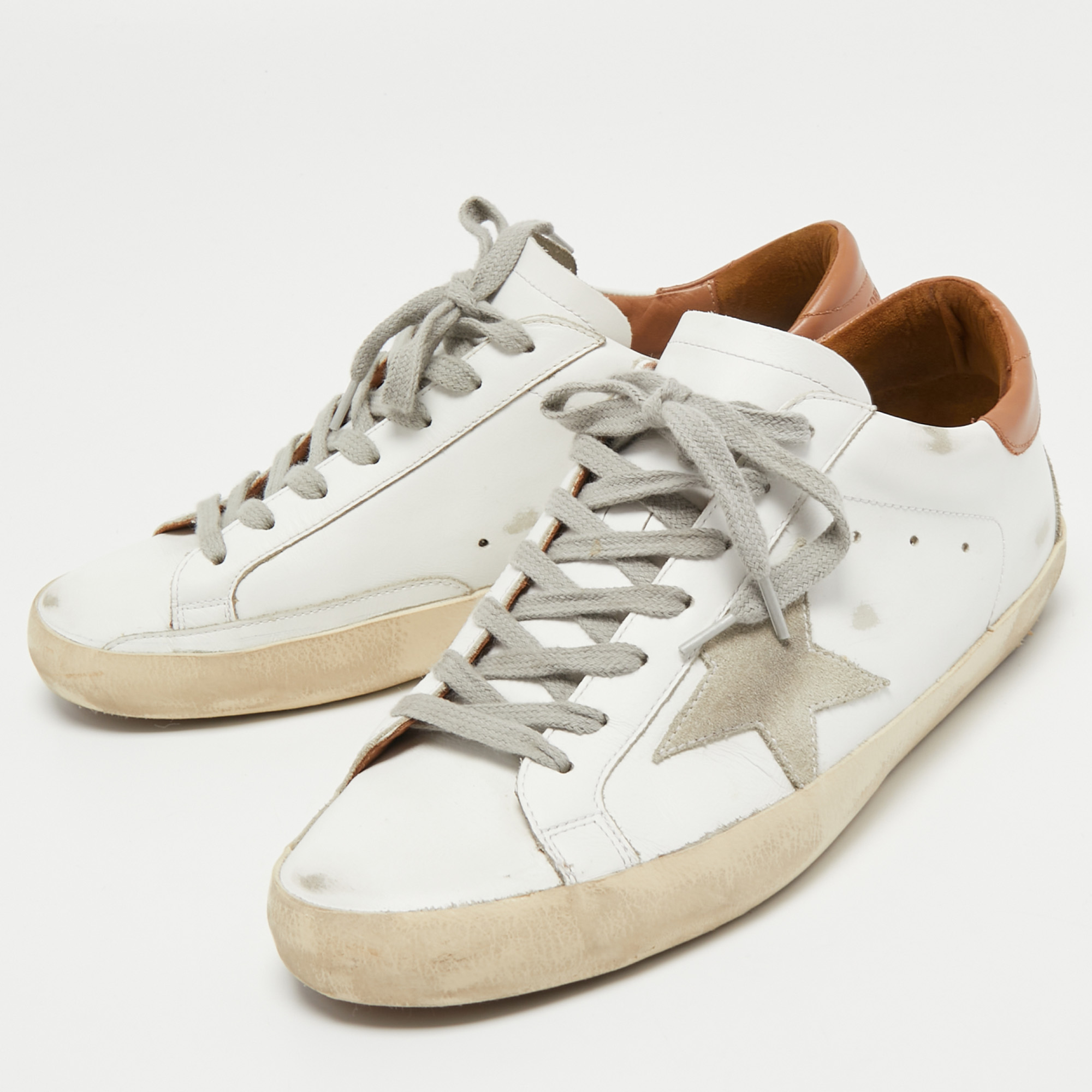 Golden Goose White/Brown Leather and Suede SuperStar Low Top Sneakers Size
Golden Goose White/Brown Leather and Suede SuperStar Low Top Sneakers Size