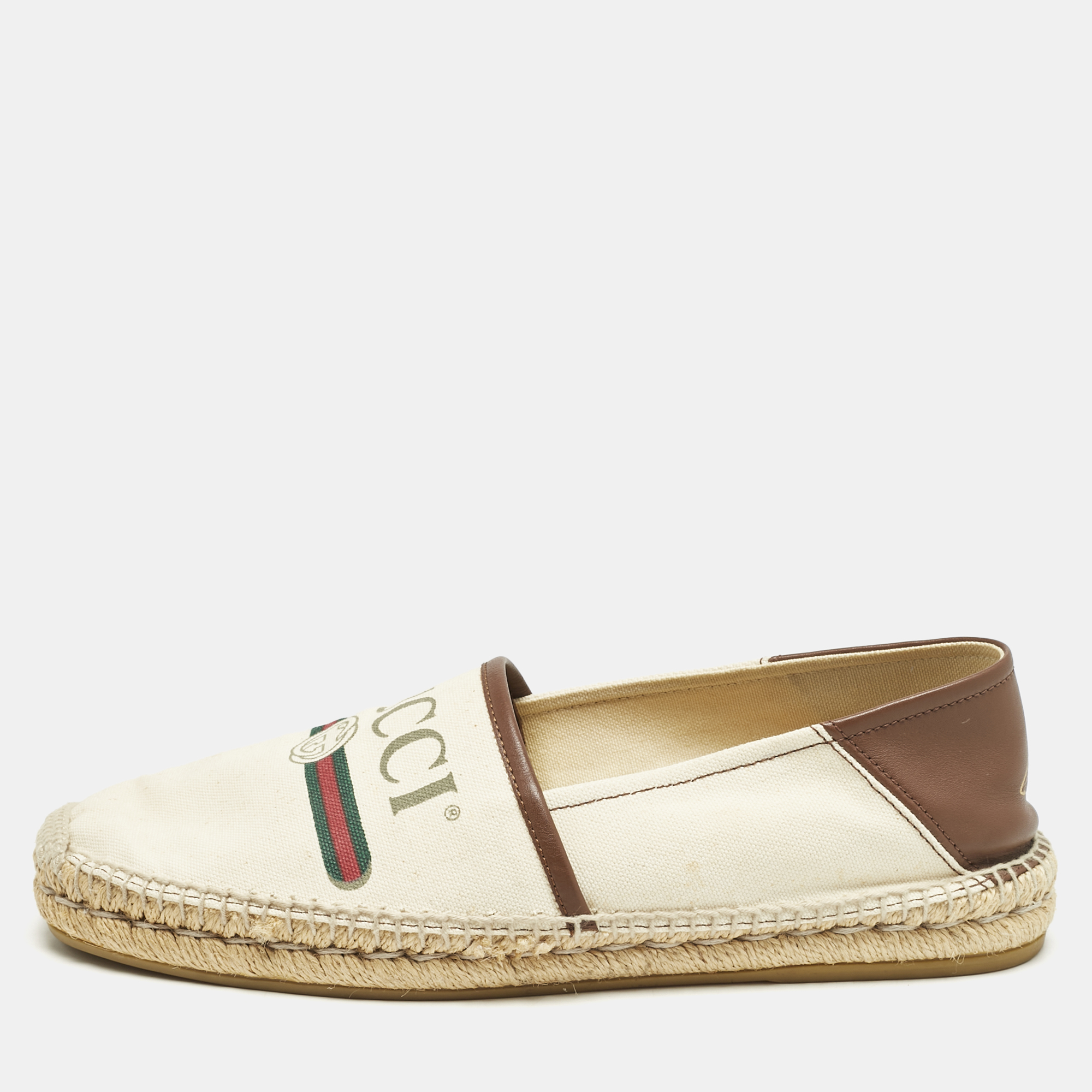 Gucci Off White Canvas Logo Graphic Print Slip On Espadrilles Size 43
Gucci Off White Canvas Logo Graphic Print Slip On Espadrilles Size 43