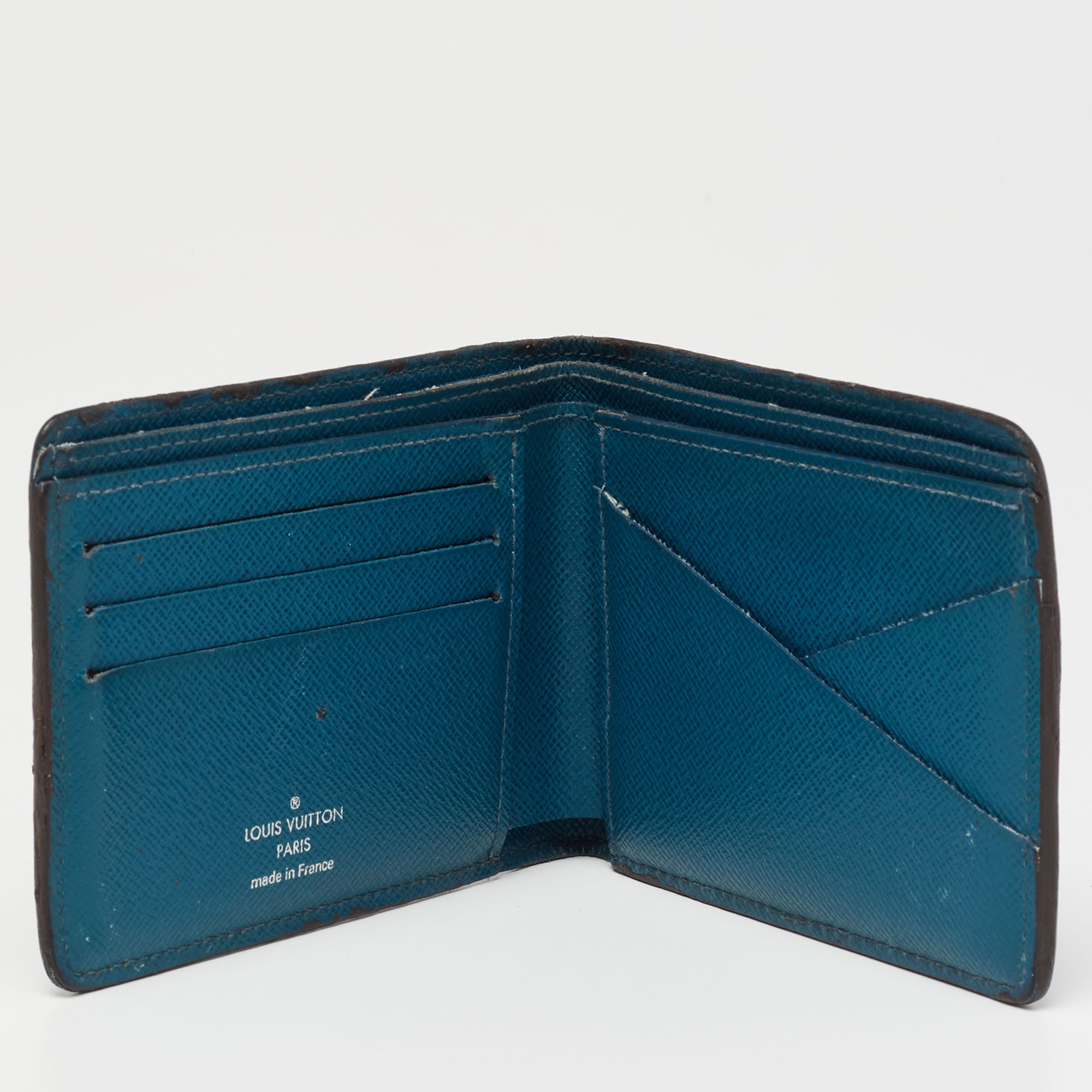 

Louis Vuitton Cyan Epi Leather Multiple Wallet, Blue