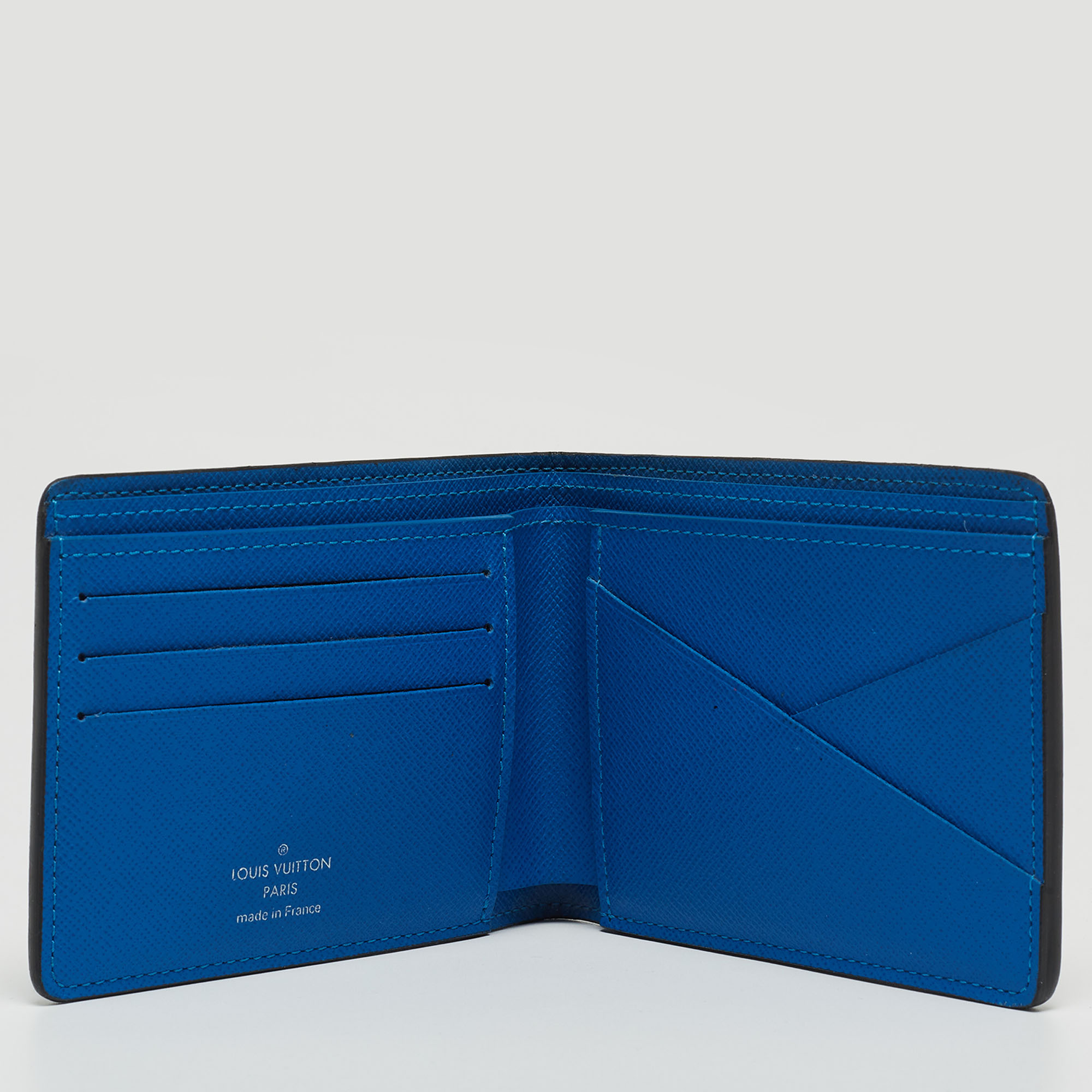 

Louis Vuitton Black/Blue Taiga Leather Multiple Wallet