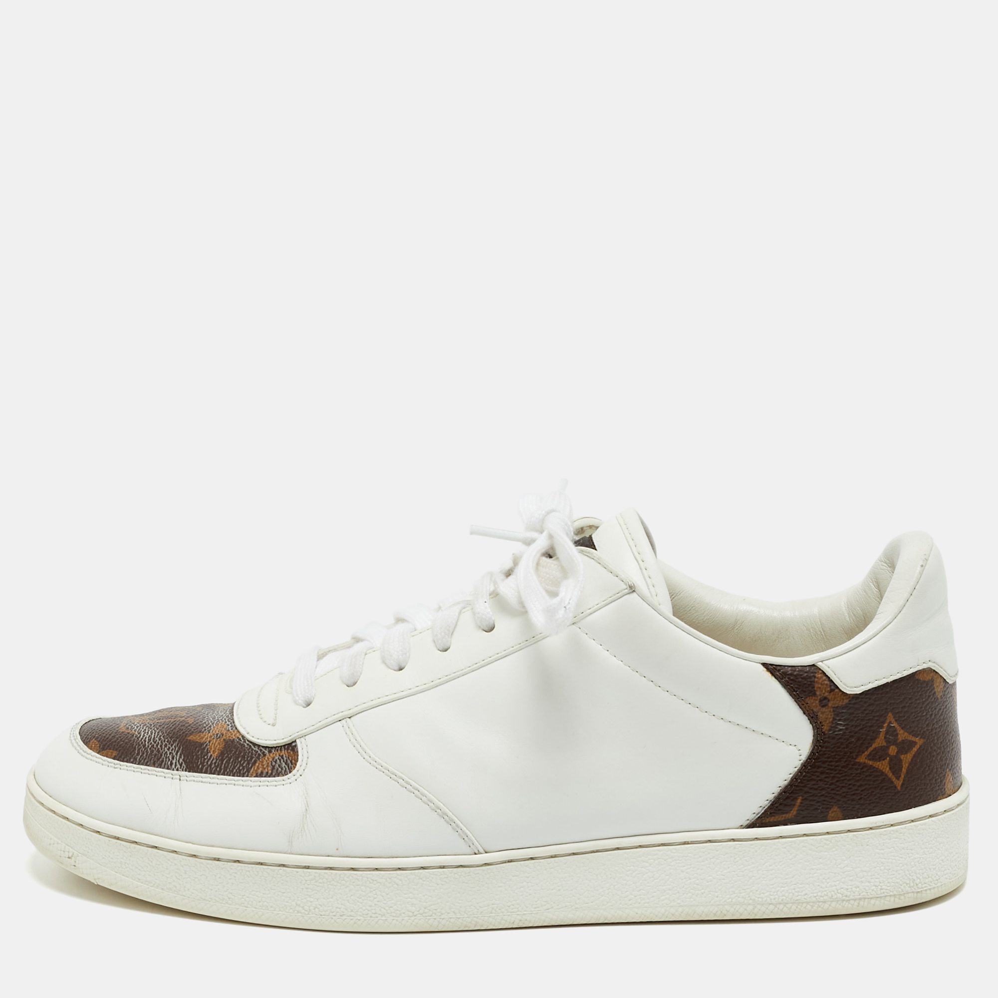 Louis Vuitton White Leather and Monogram Canvas Rivoli Sneakers Size 41
Louis Vuitton White Leather and Monogram Canvas Rivoli Sneakers Size 41