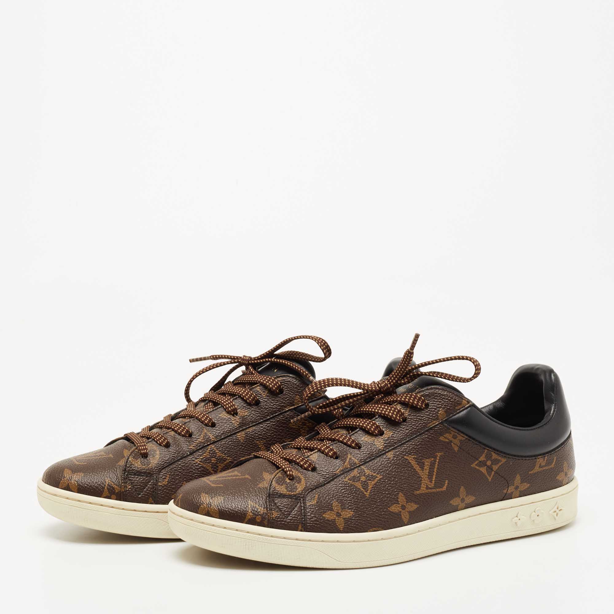 Louis Vuitton Brown Monogram Canvas and Leather Frontrow Low Top Sneakers Size
Louis Vuitton Brown Monogram Canvas and Leather Frontrow Low Top Sneakers Size