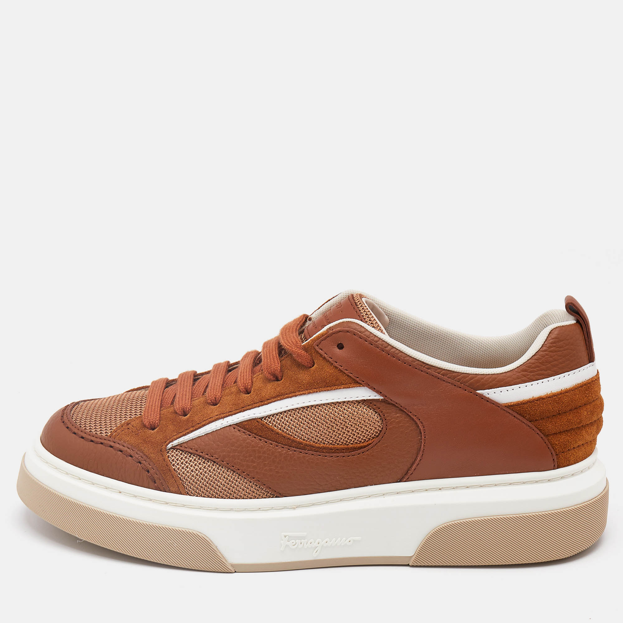 Salvatore Ferragamo Brown Mesh and Suede Slip On Sneakers Size 43
Salvatore Ferragamo Brown Mesh and Suede Slip On Sneakers Size 43