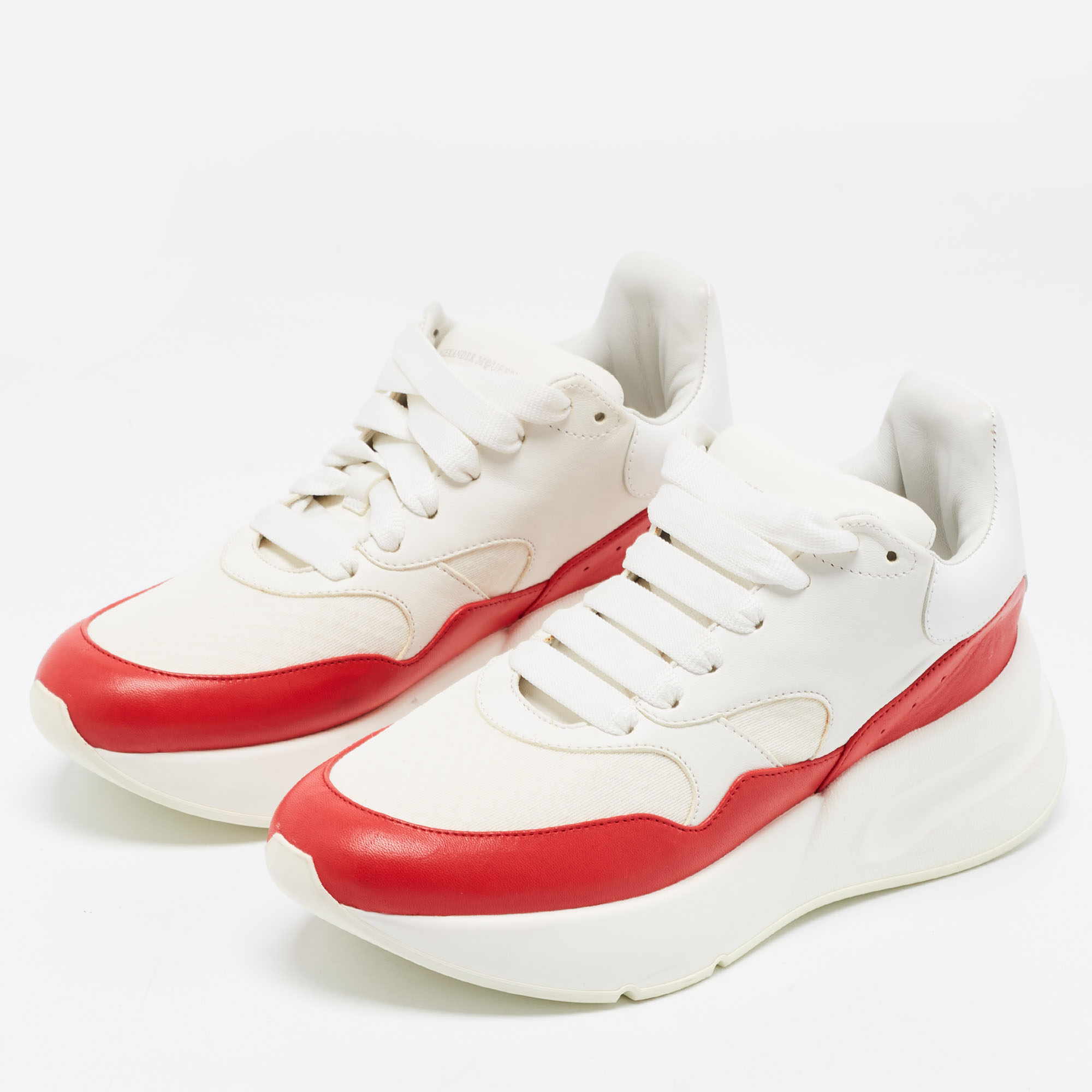 Alexander McQueen Red/White Leather and Fabric Oversized Low Top Sneakers Size
Alexander McQueen Red/White Leather and Fabric Oversized Low Top Sneakers Size