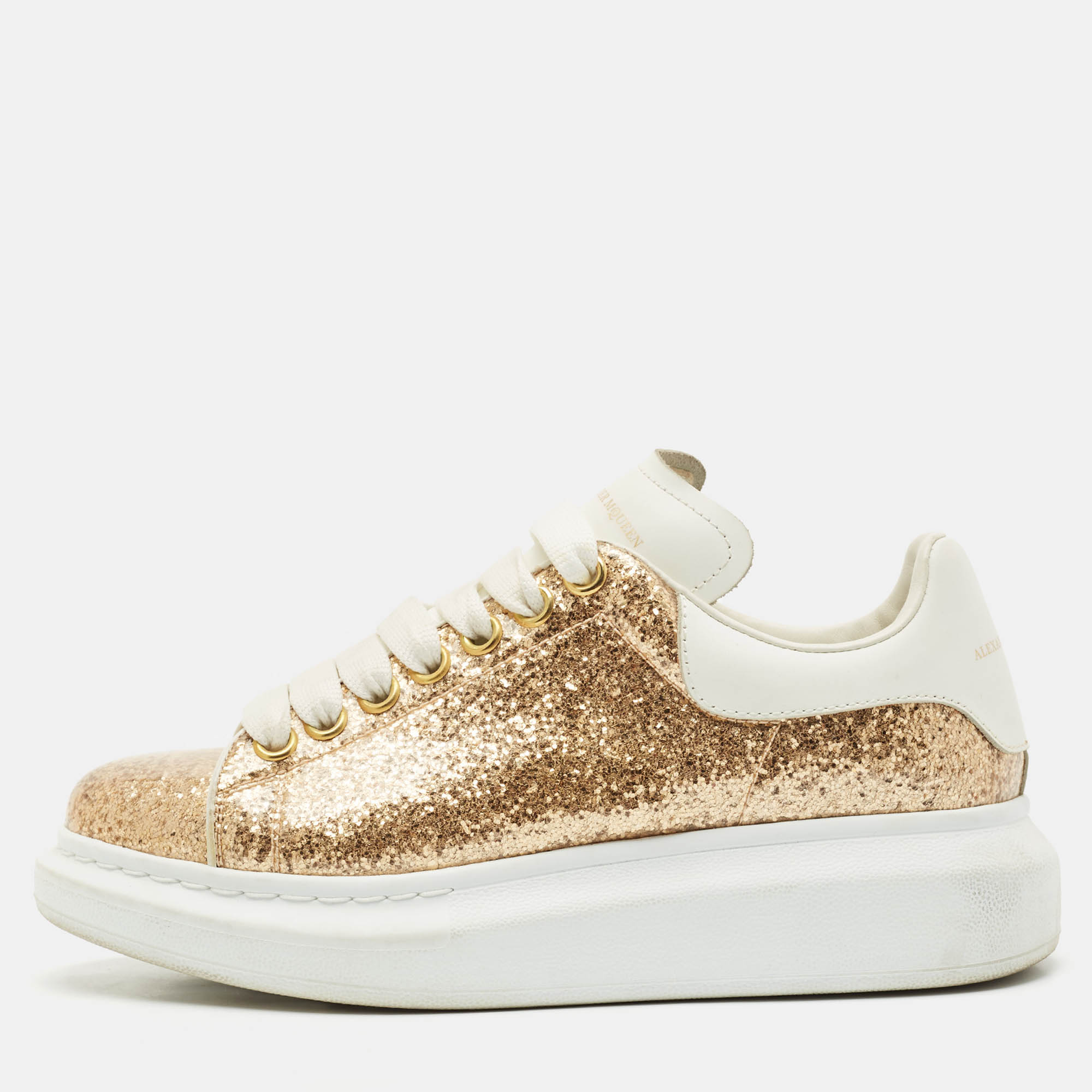 Alexander McQueen White/Gold PVC and Leather Oversized Sneakers Size
Alexander McQueen White/Gold PVC and Leather Oversized Sneakers Size