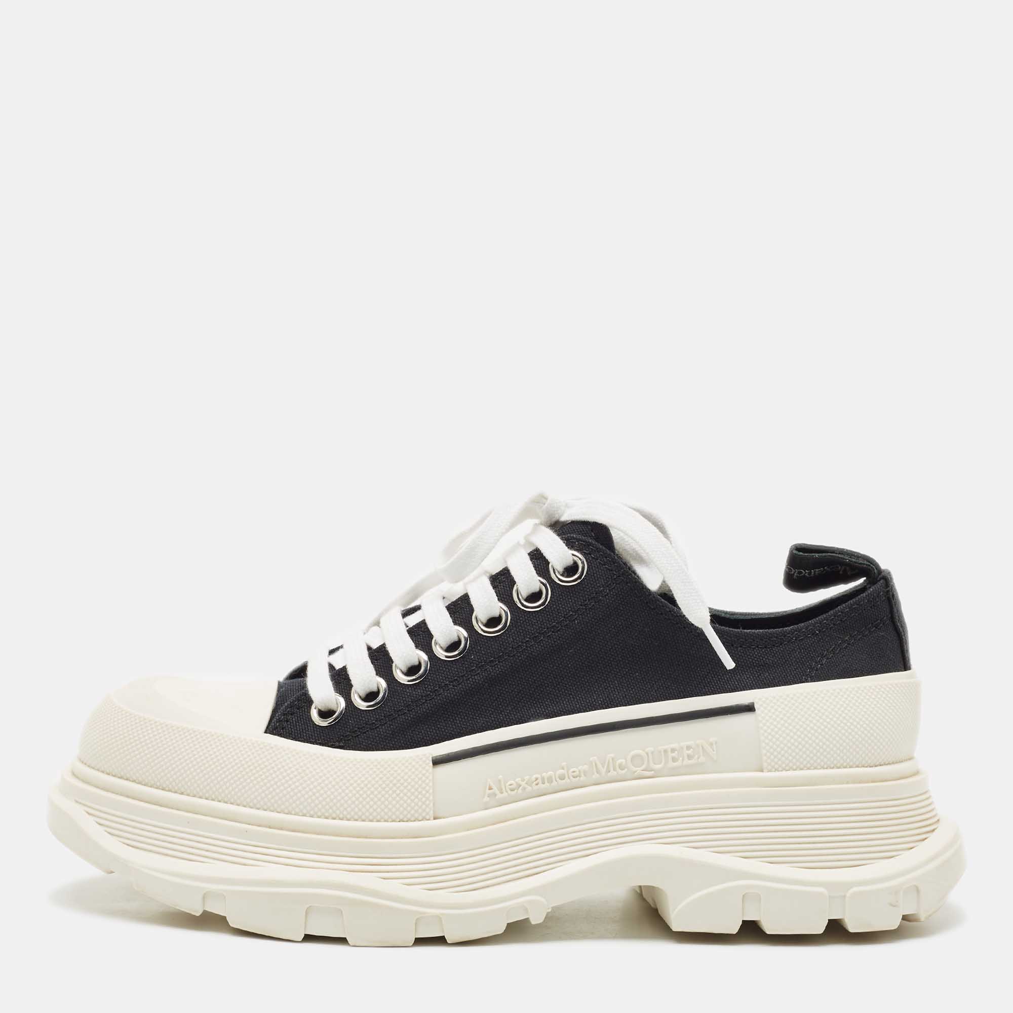 Alexander McQueen Black/White Canvas and Rubber Tread Slick Sneakers Size
Alexander McQueen Black/White Canvas and Rubber Tread Slick Sneakers Size