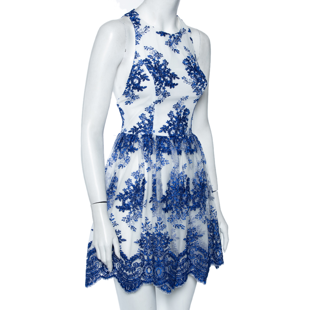 Alice + Olivia Navy Blue & White Embroidered Tulle Sleeveless Dress
Alice + Olivia Navy Blue & White Embroidered Tulle Sleeveless Dress