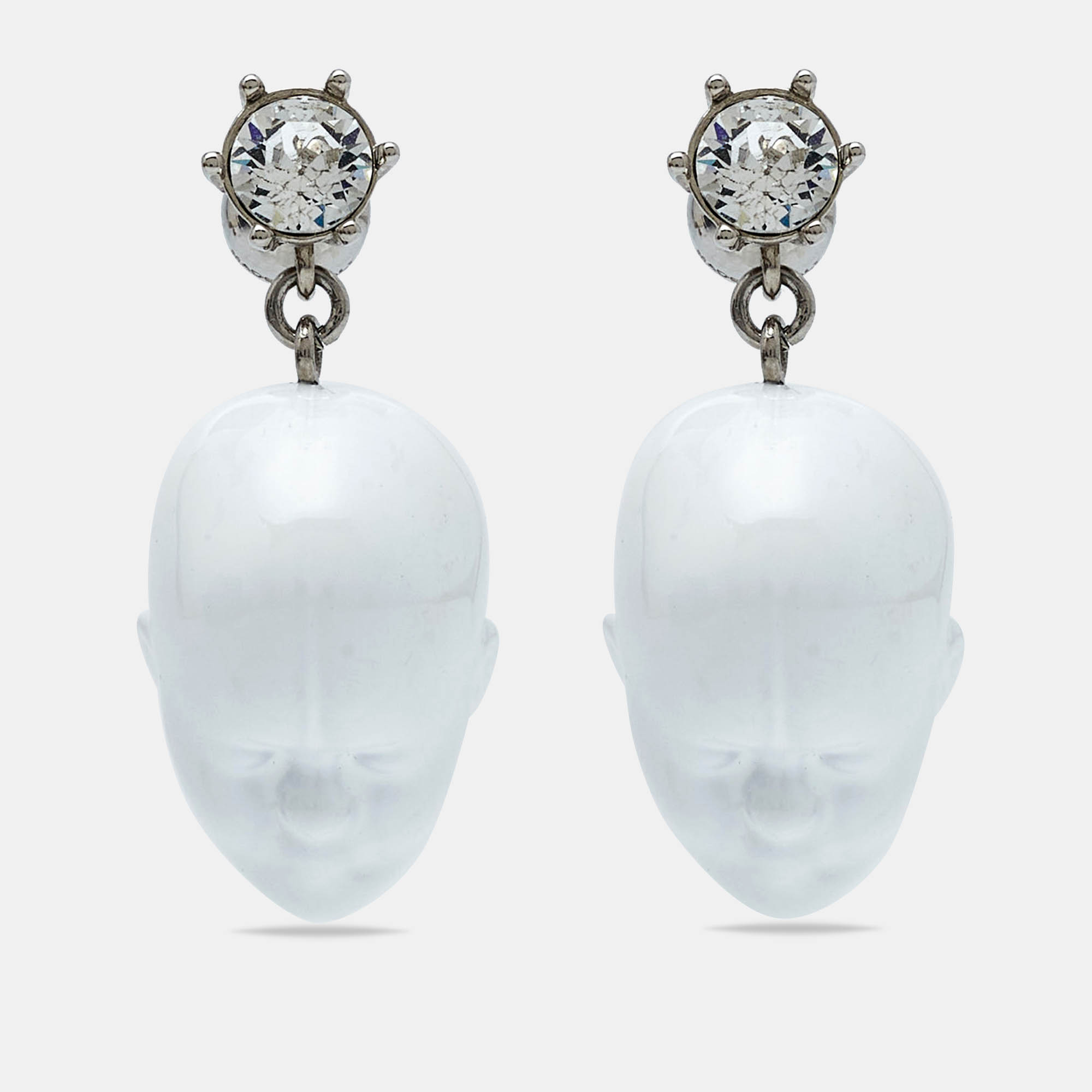 Burberry crystal and doll's head silver tone earrings