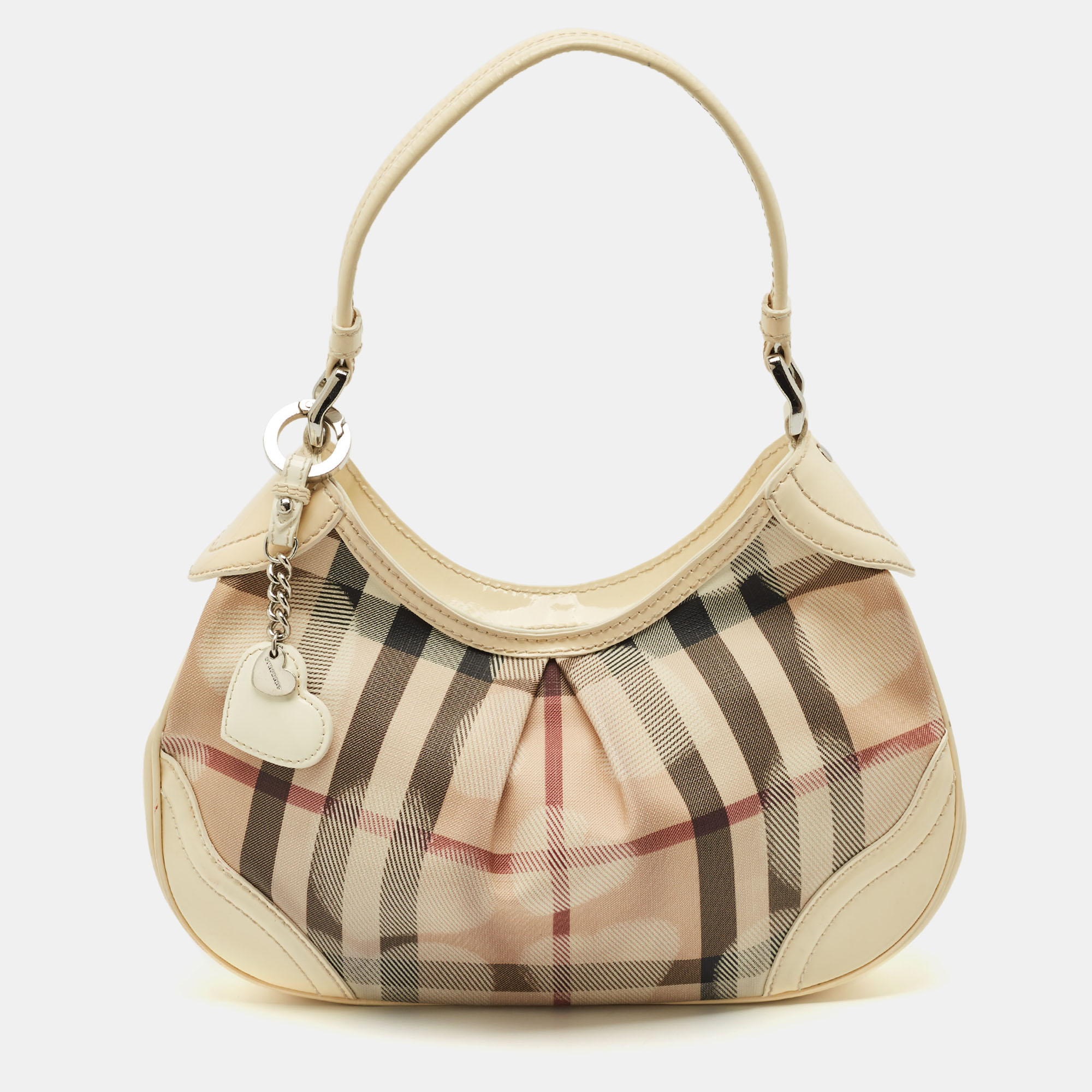 Burberry Cream/Beige House Check Heart PVC and Patent Leather Brooklyn Hobo
Burberry Cream/Beige House Check Heart PVC and Patent Leather Brooklyn Hobo