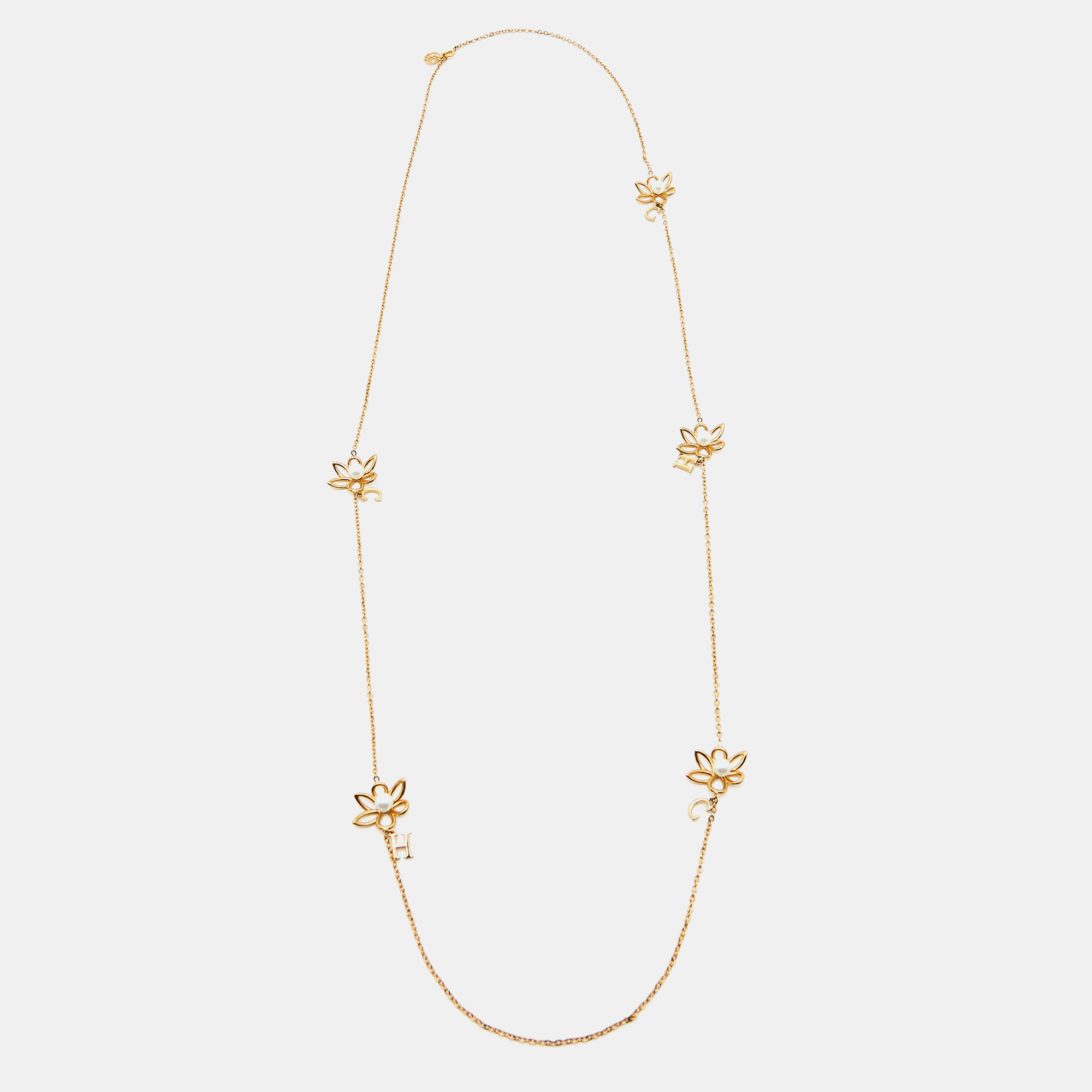 Carolina herrera  ch floral faux pearl gold tone long necklace