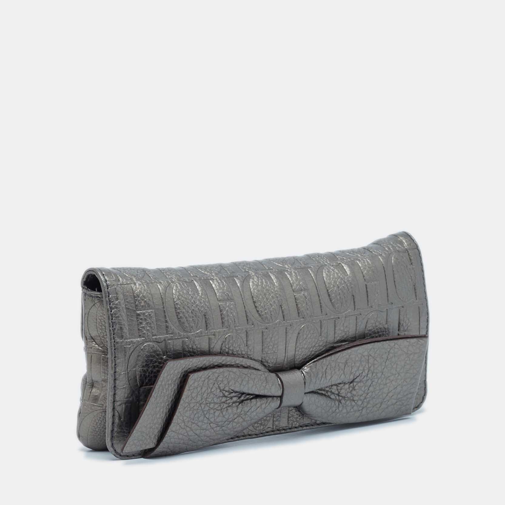 Carolina Herrera Metallic Monogram Embossed Leather Audrey Clutch