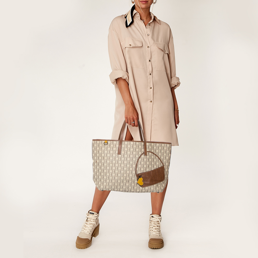 Carolina Herrera Beige/Brown Monogram Coated Canvas and Leather Charm Tote
Carolina Herrera Beige/Brown Monogram Coated Canvas and Leather Charm Tote