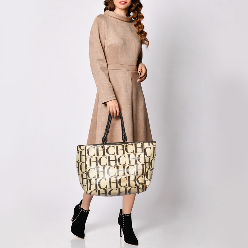 Carolina Herrera Beige/Brown Monogram Canvas And Leather Braided Handle Tote
Carolina Herrera Beige/Brown Monogram Canvas And Leather Braided Handle Tote