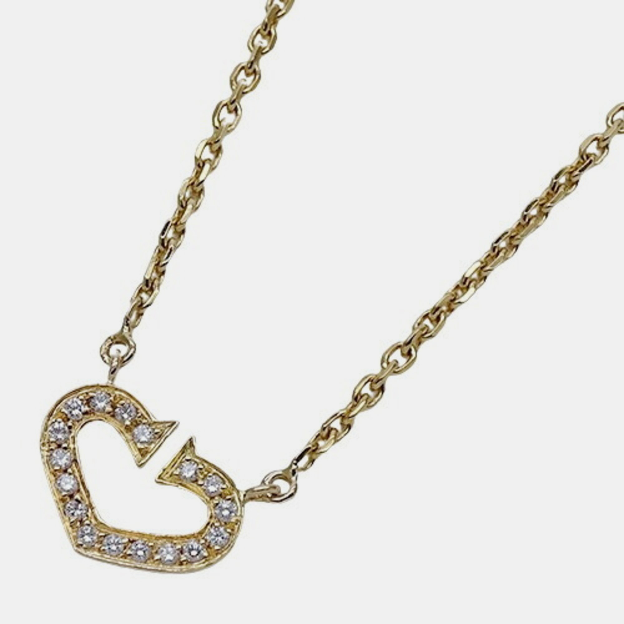 Cartier 18k yellow gold and diamond hearts and symbols pendant necklace