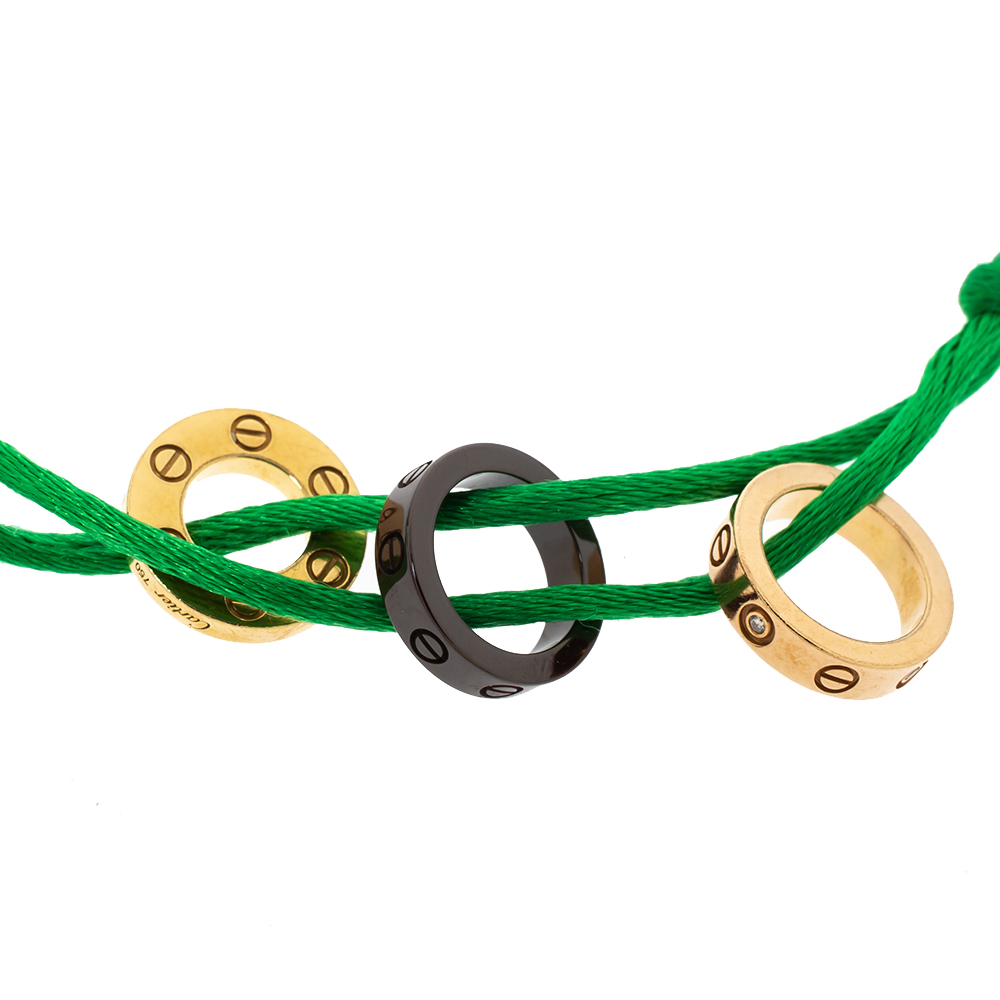 Cartier Love Diamond Ceramic Two Tone 18K Gold Green Cord Adjustable Bracelet
Cartier Love Diamond Ceramic Two Tone 18K Gold Green Cord Adjustable Bracelet