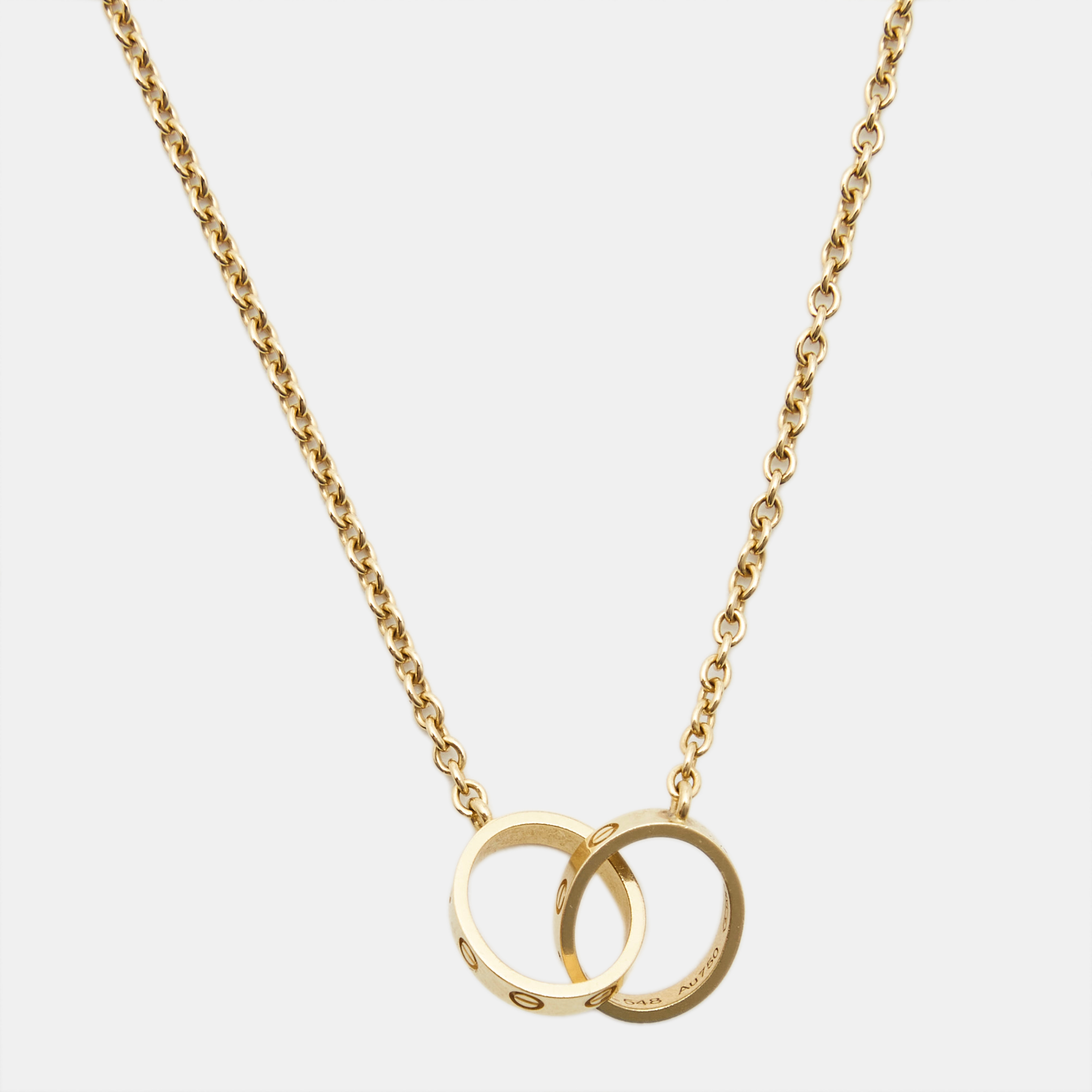 Cartier love interlocking loops 18k yellow gold necklace