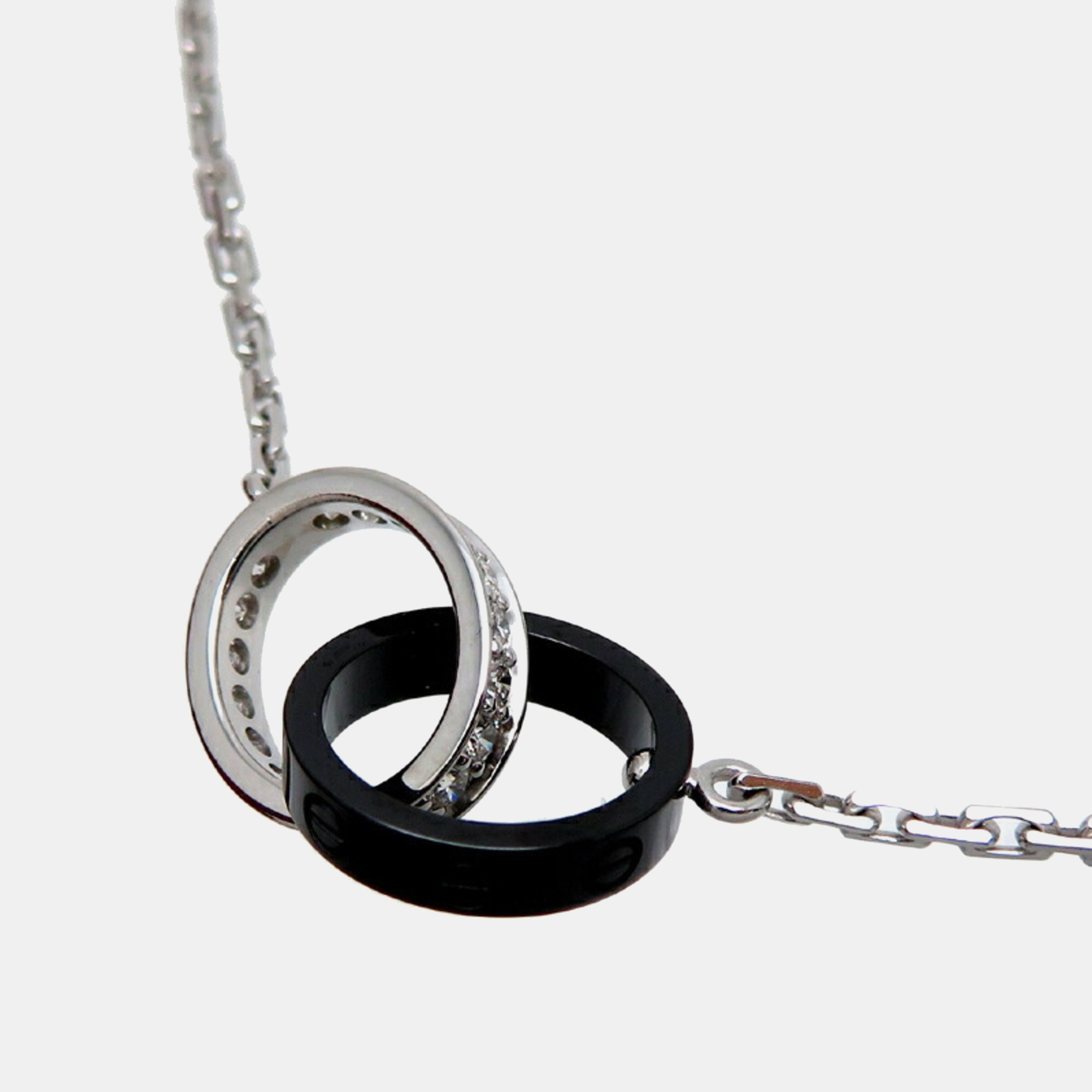 Cartier 18k white gold and diamond paved love pendant necklace