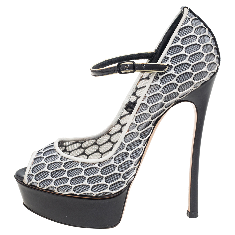 Casadei White/ Black Leather and Mesh Laser Cut Ankle-Strap Platform Pumps Size
Casadei White/ Black Leather and Mesh Laser Cut Ankle-Strap Platform Pumps Size