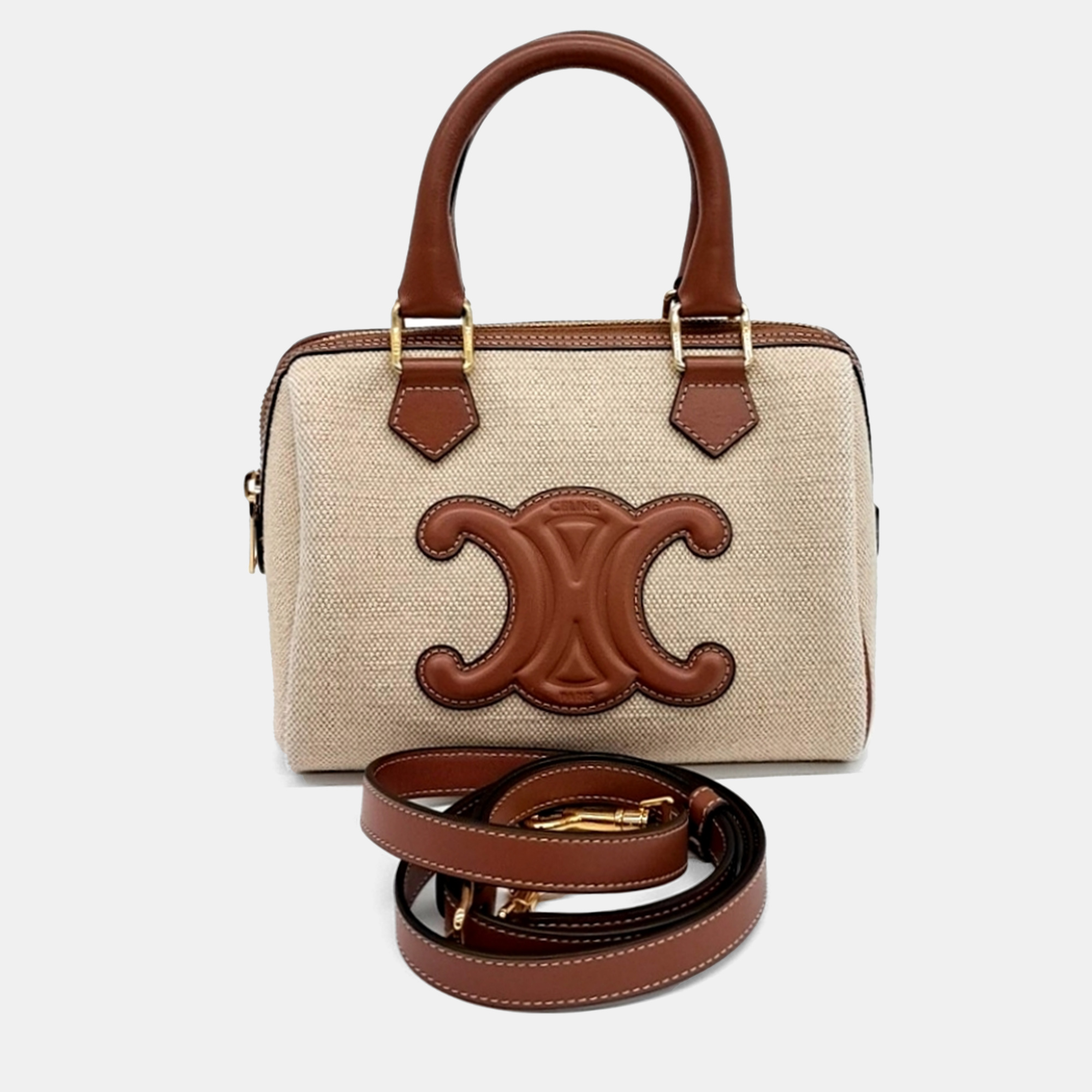 Celine Beige/Tan Canvas and Leather Cuir Triomphe Small Boston Bag
Celine Beige/Tan Canvas and Leather Cuir Triomphe Small Boston Bag