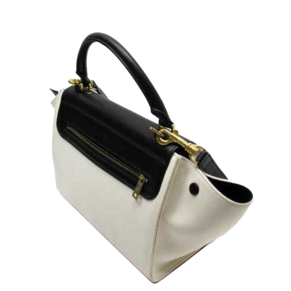 Celine Black/White Leather and Canavs Trapeze Top Handle Bag
Celine Black/White Leather and Canavs Trapeze Top Handle Bag