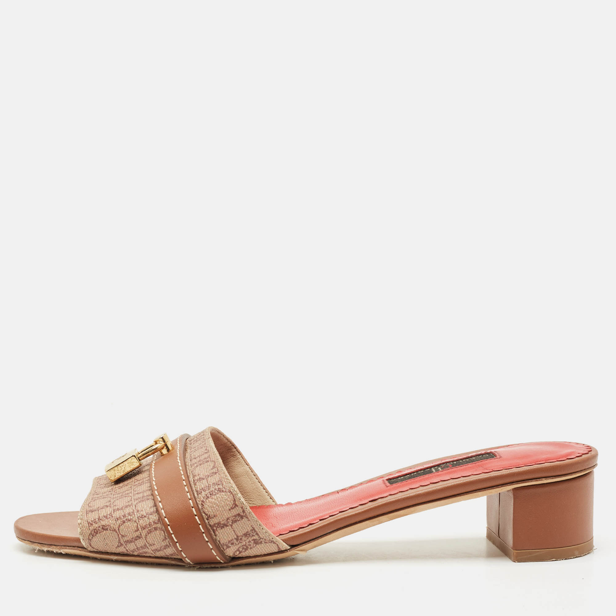 CH Carolina Herrera Brown Monogram Canvas Matryoshka Locked Slide Sandals Size
CH Carolina Herrera Brown Monogram Canvas Matryoshka Locked Slide Sandals Size