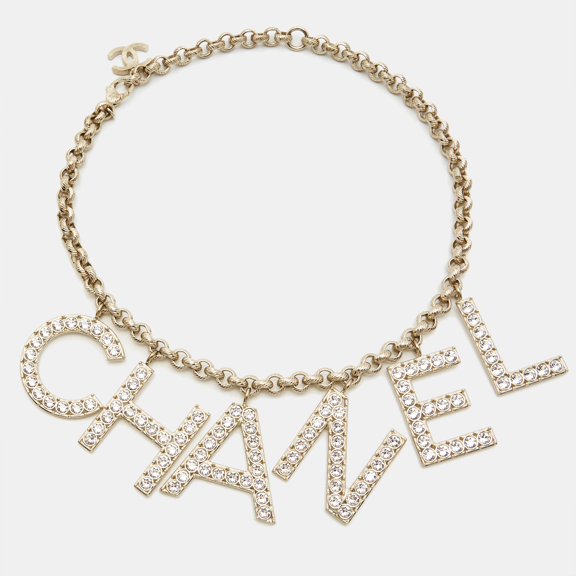 Chanel letter logo crystal gold tone necklace