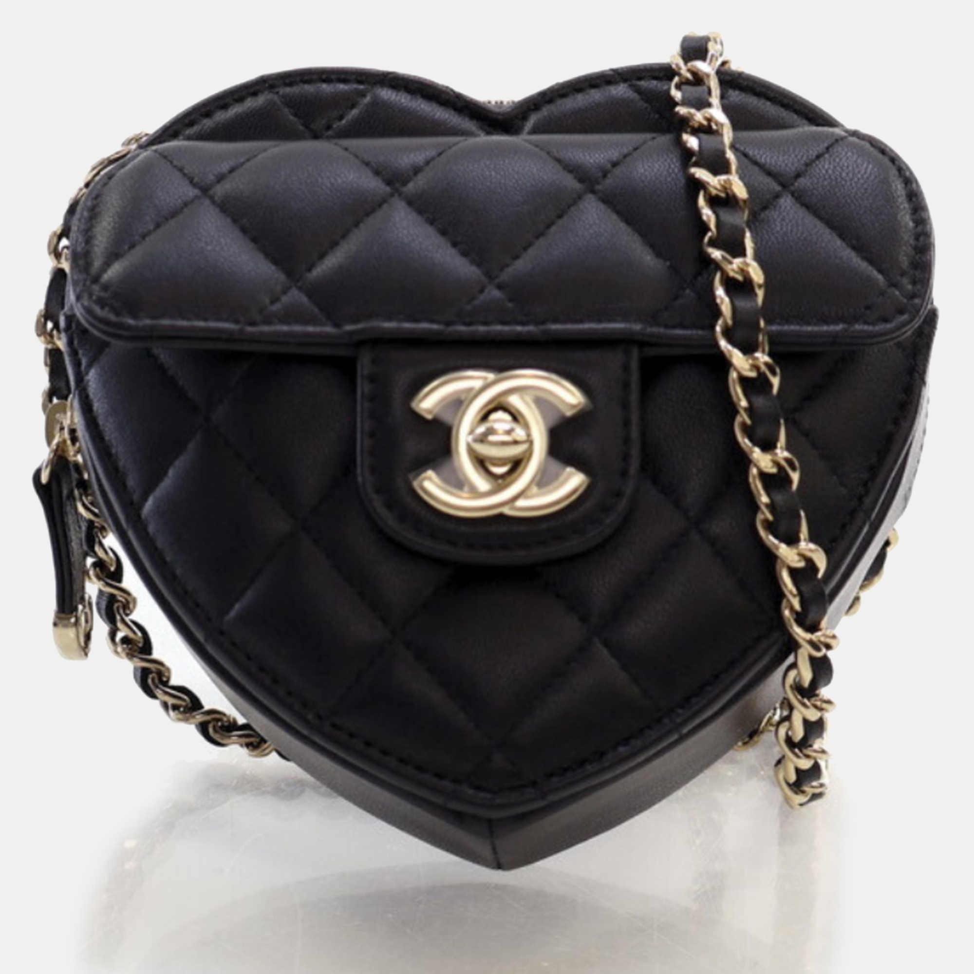 Chanel black lambskin quilted cc in love heart clutch with chain