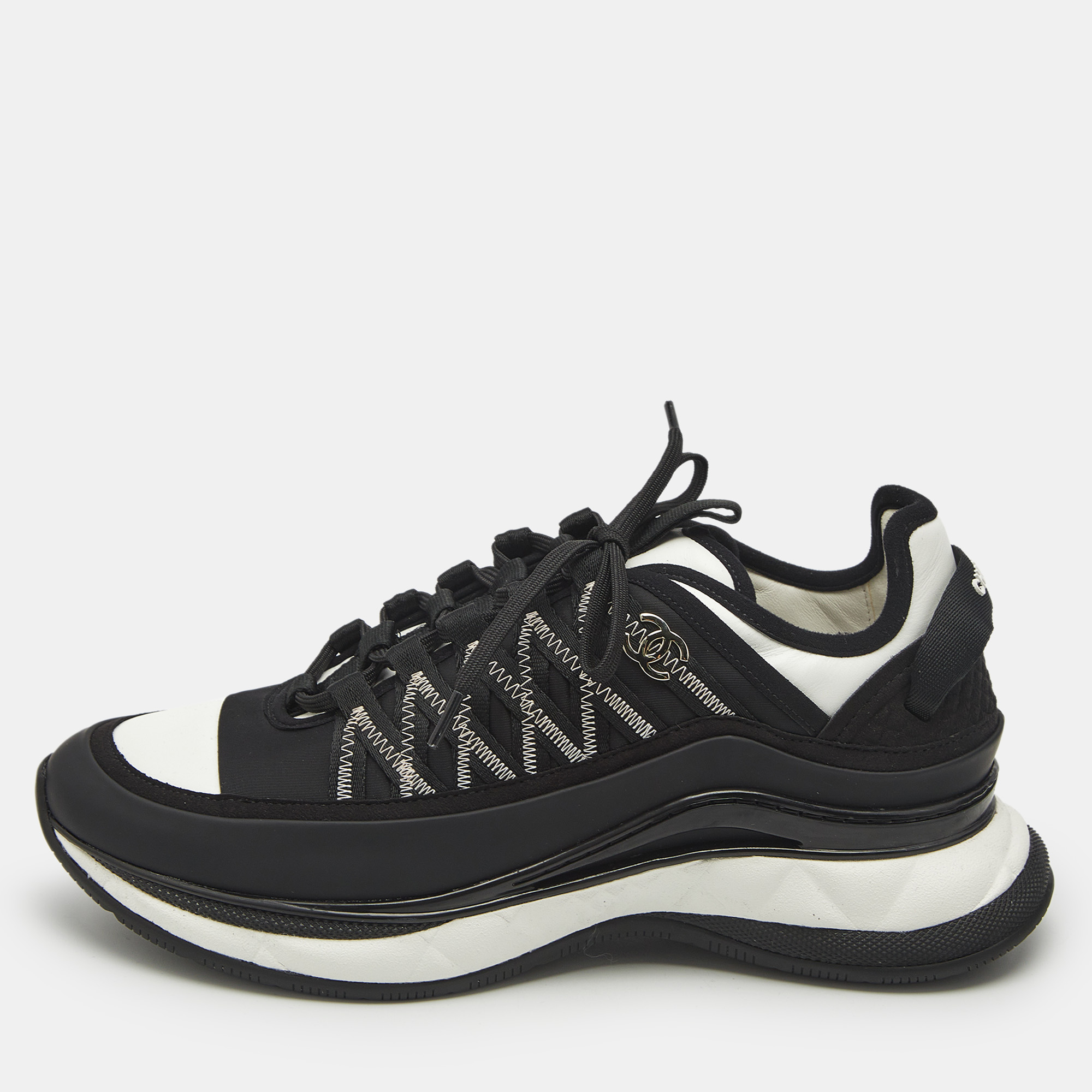 Chanel Black/White Nylon and Leather CC Low Top Sneakers Size
Chanel Black/White Nylon and Leather CC Low Top Sneakers Size