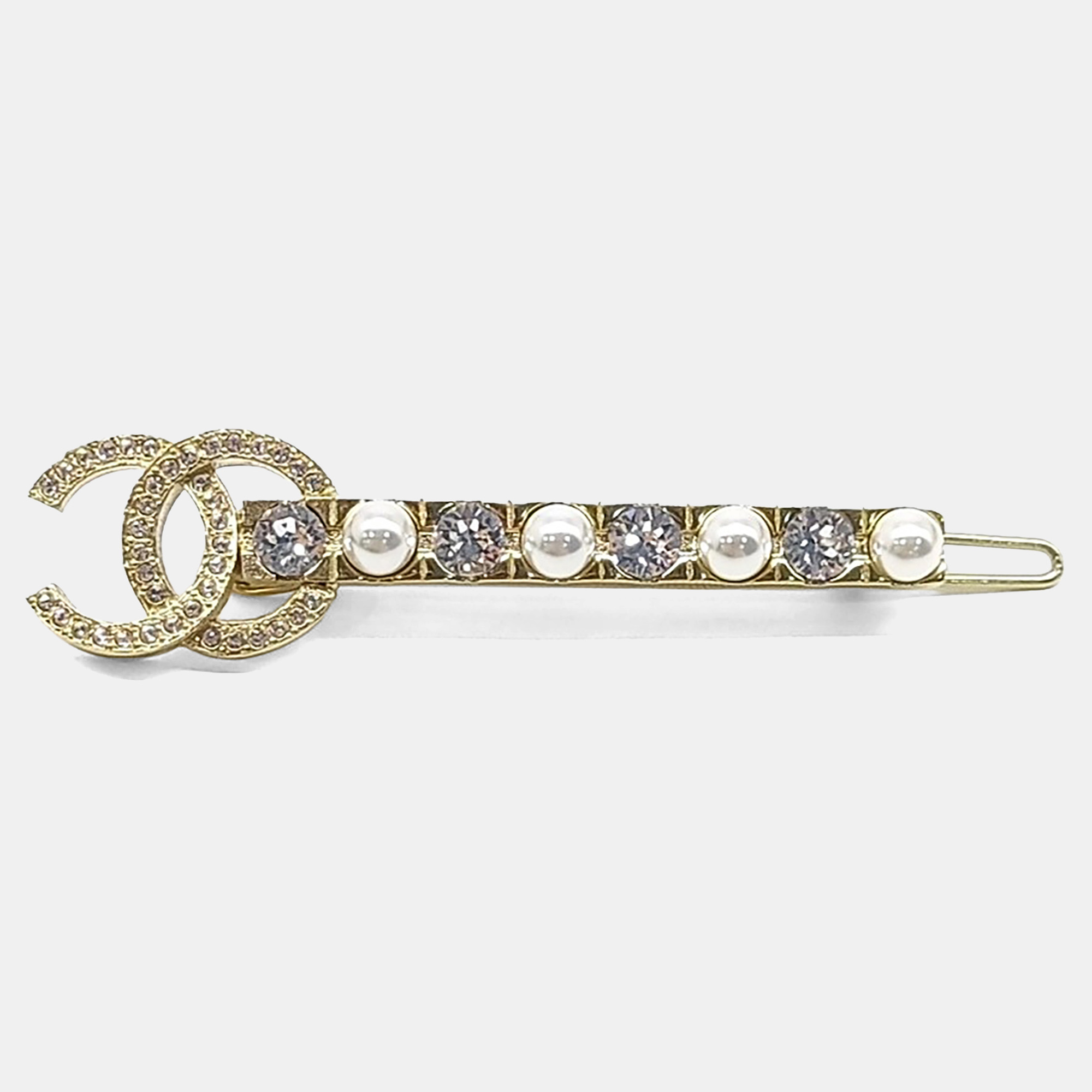 Chanel Gold Tone Faux Pearl hairpin
Chanel Gold Tone Faux Pearl hairpin