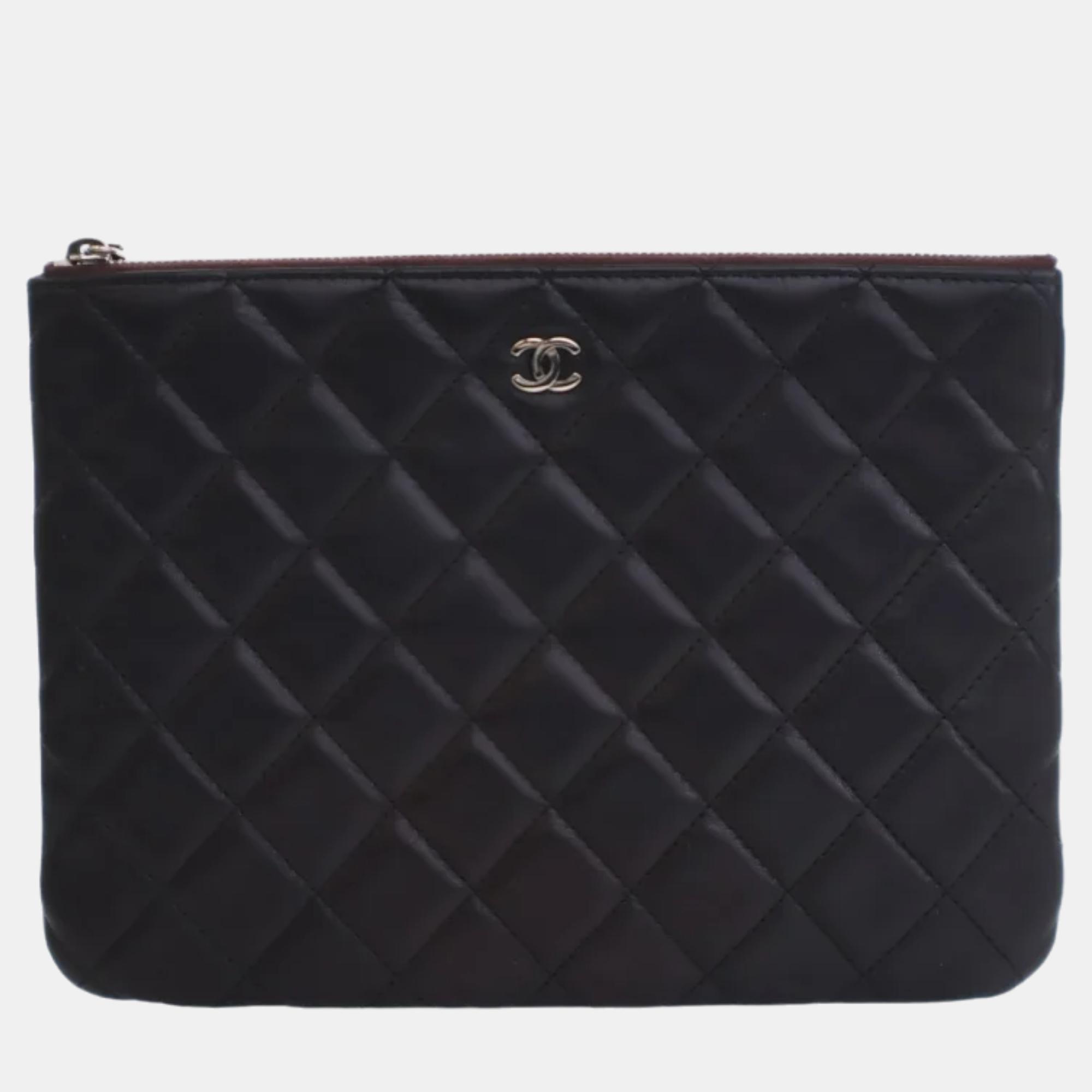 Chanel black lambskin quilted medium cosmetic case