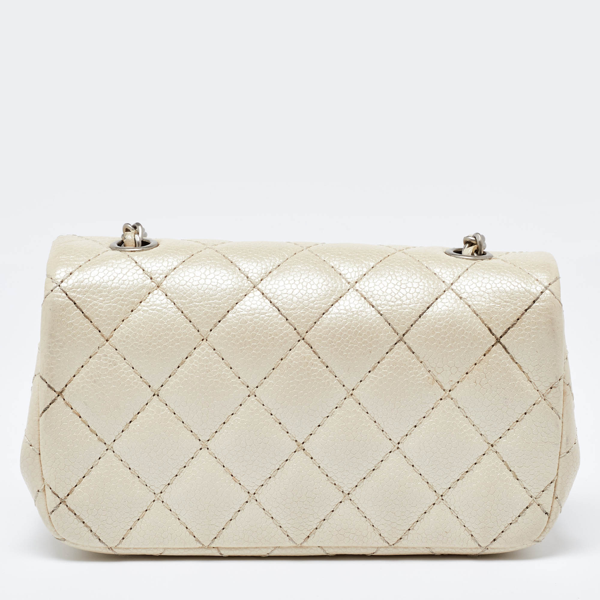 Chanel Pearl Beige Quilted Caviar Leather New Mini Classic Flap Bag