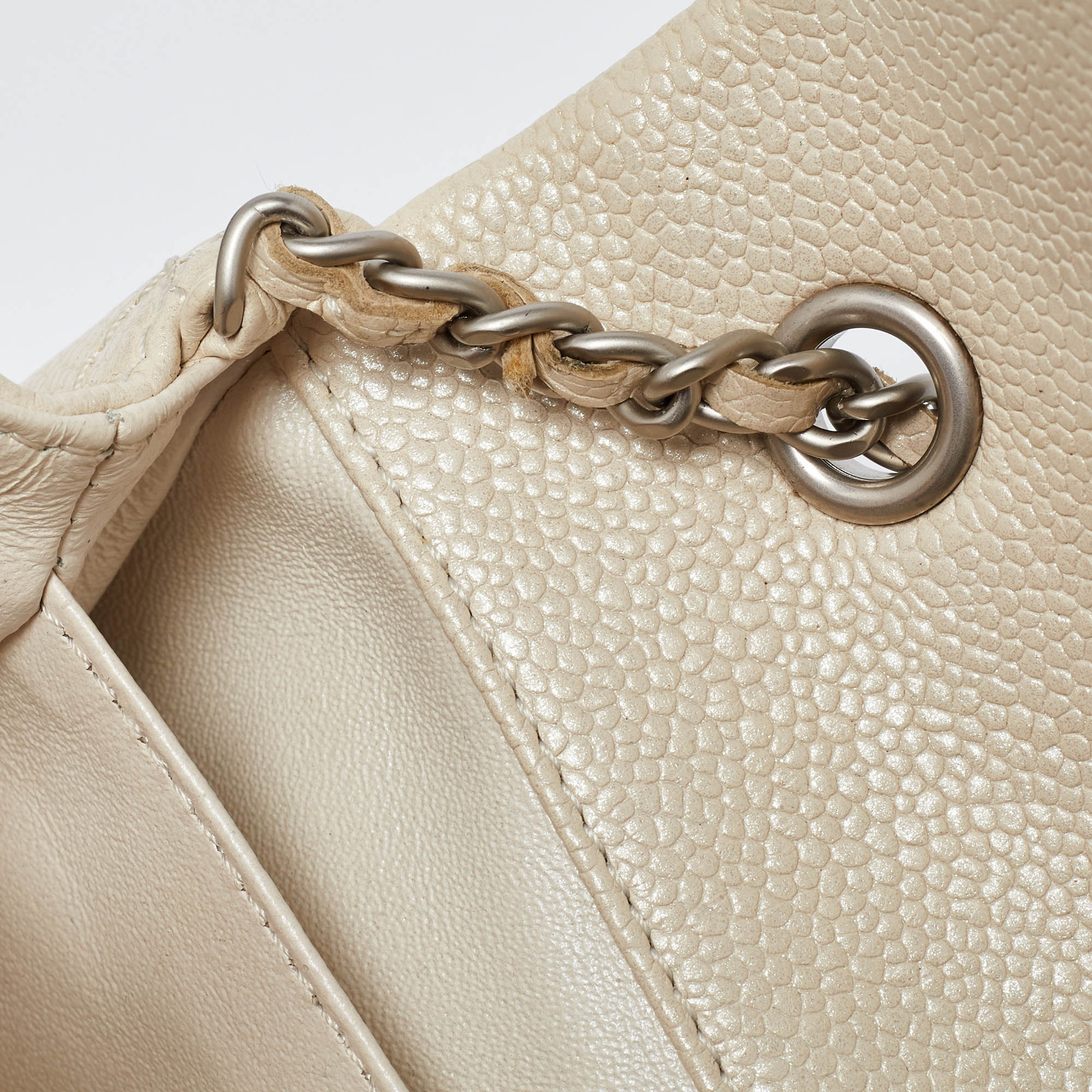 Chanel Pearl Beige Quilted Caviar Leather New Mini Classic Flap Bag