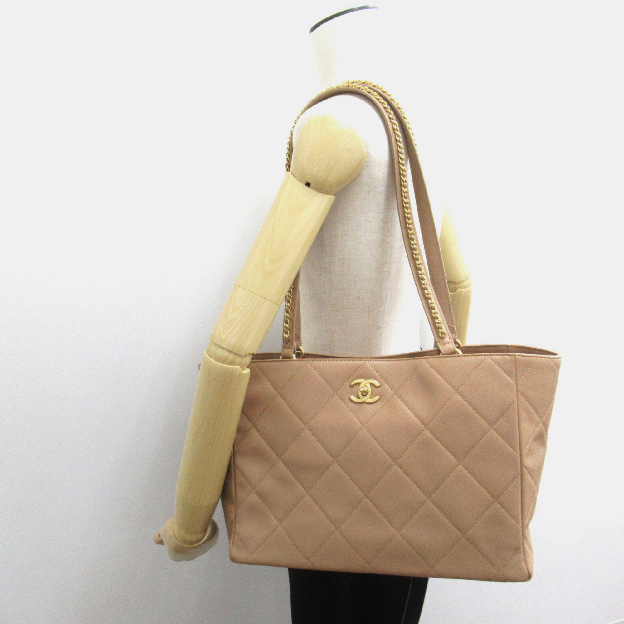 Chanel Beige Calfskin Quilted Book Pocket Shopping Tote Bag