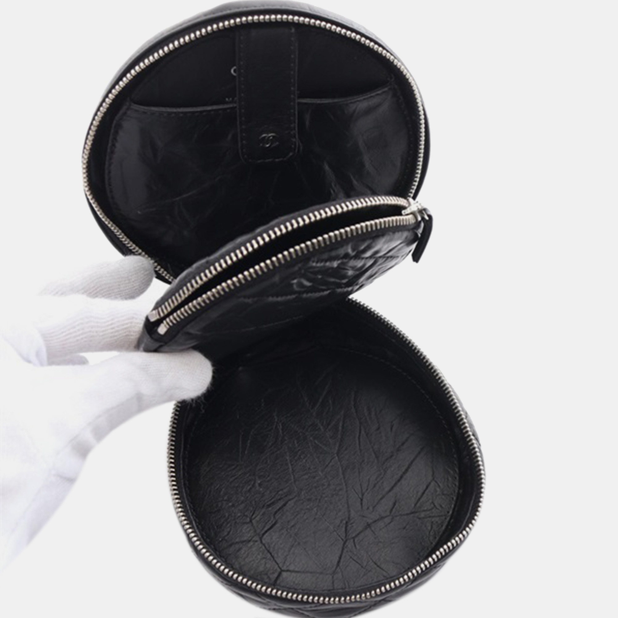 Chanel Black Quilted Aged Calfskin Round Clutch Bag