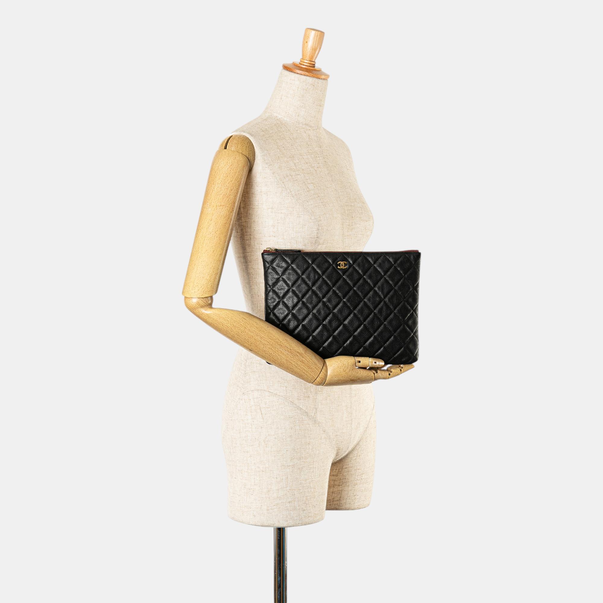 Chanel Black Medium Quilted Caviar O Case Clutch