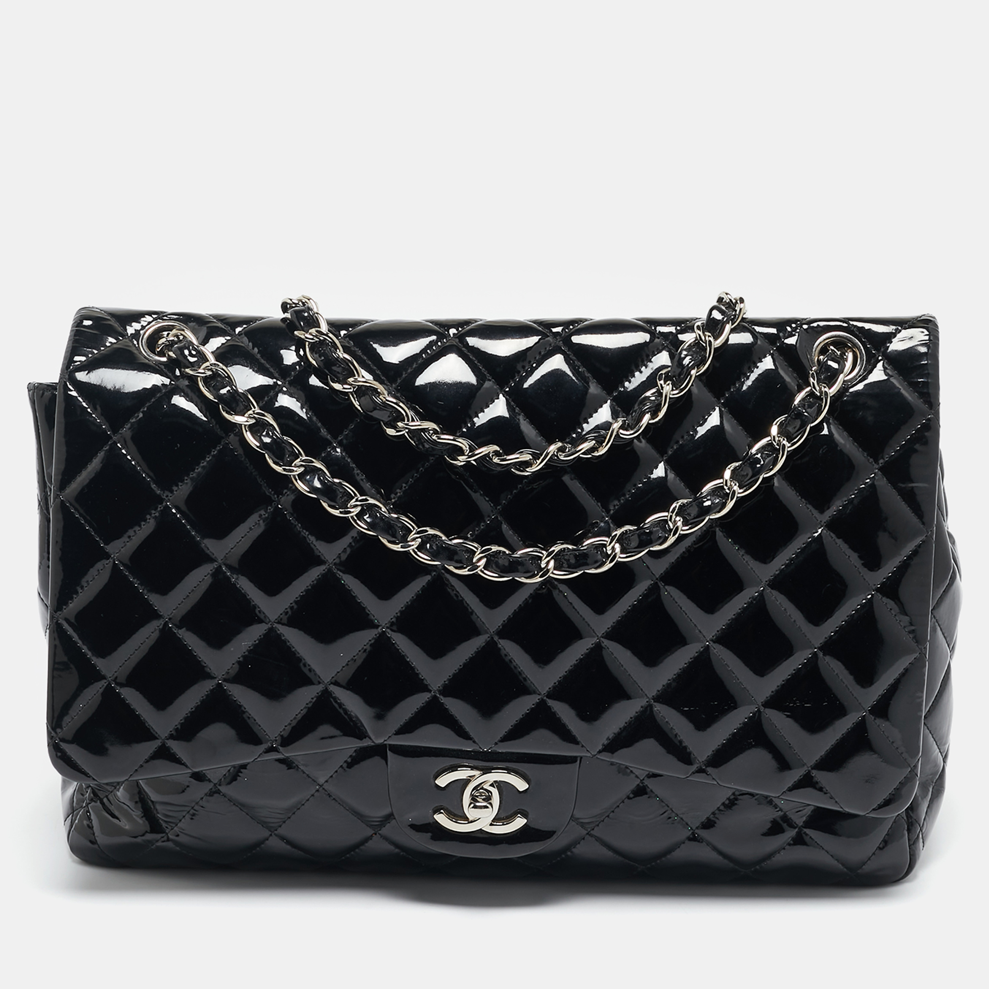 Chanel Black Quilted Patent Leather Maxi Classic Single Flap Bag
Chanel Black Quilted Patent Leather Maxi Classic Single Flap Bag
