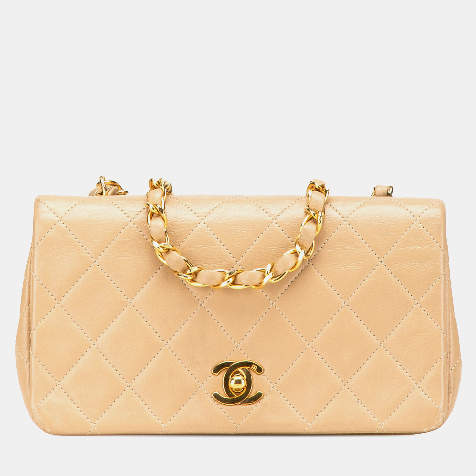 Chanel Beige Mini Rectangular CC Quilted Lambskin Full Single Flap
Chanel Beige Mini Rectangular CC Quilted Lambskin Full Single Flap