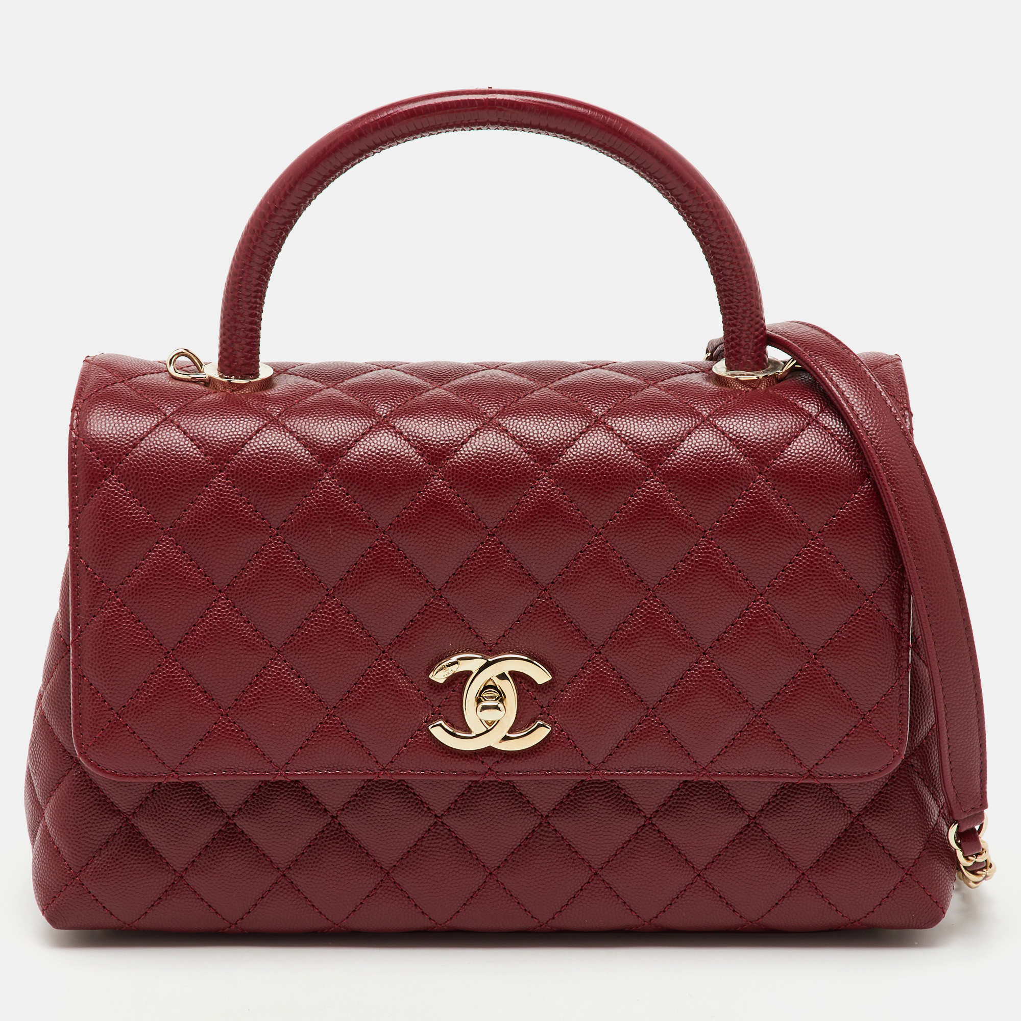 Chanel Red Quilted Caviar Leather and Lizard Embossed Leather Small Coco Top Handle Bag
Chanel Red Quilted Caviar Leather and Lizard Embossed Leather Small Coco Top Handle Bag