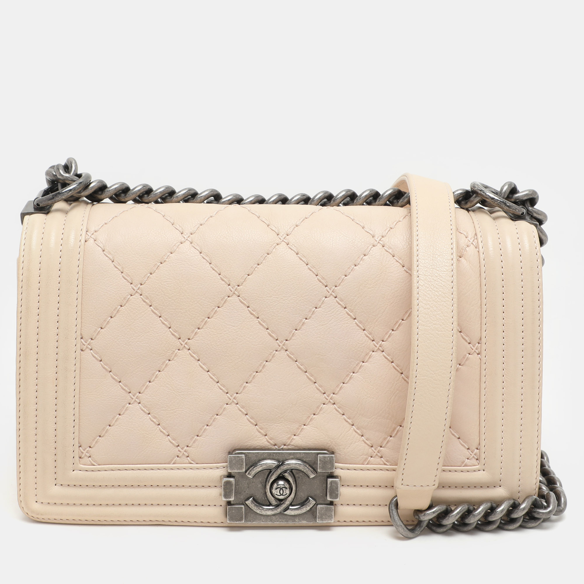 Chanel Beige Quilted Wild Stitched Leather Medium Boy Flap Bag
Chanel Beige Quilted Wild Stitched Leather Medium Boy Flap Bag