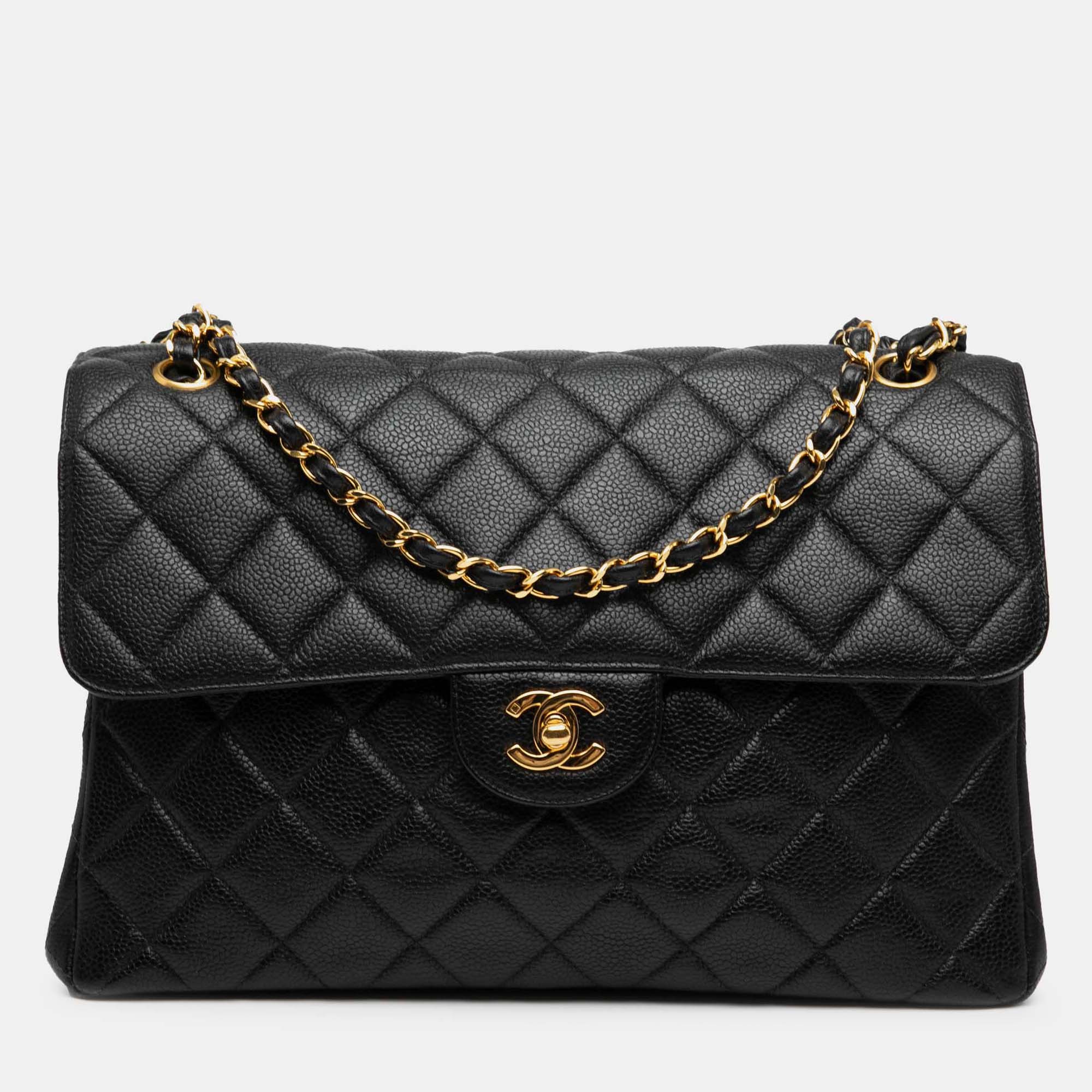 Chanel Black Jumbo Quilted Caviar Double Sided Flap
Chanel Black Jumbo Quilted Caviar Double Sided Flap