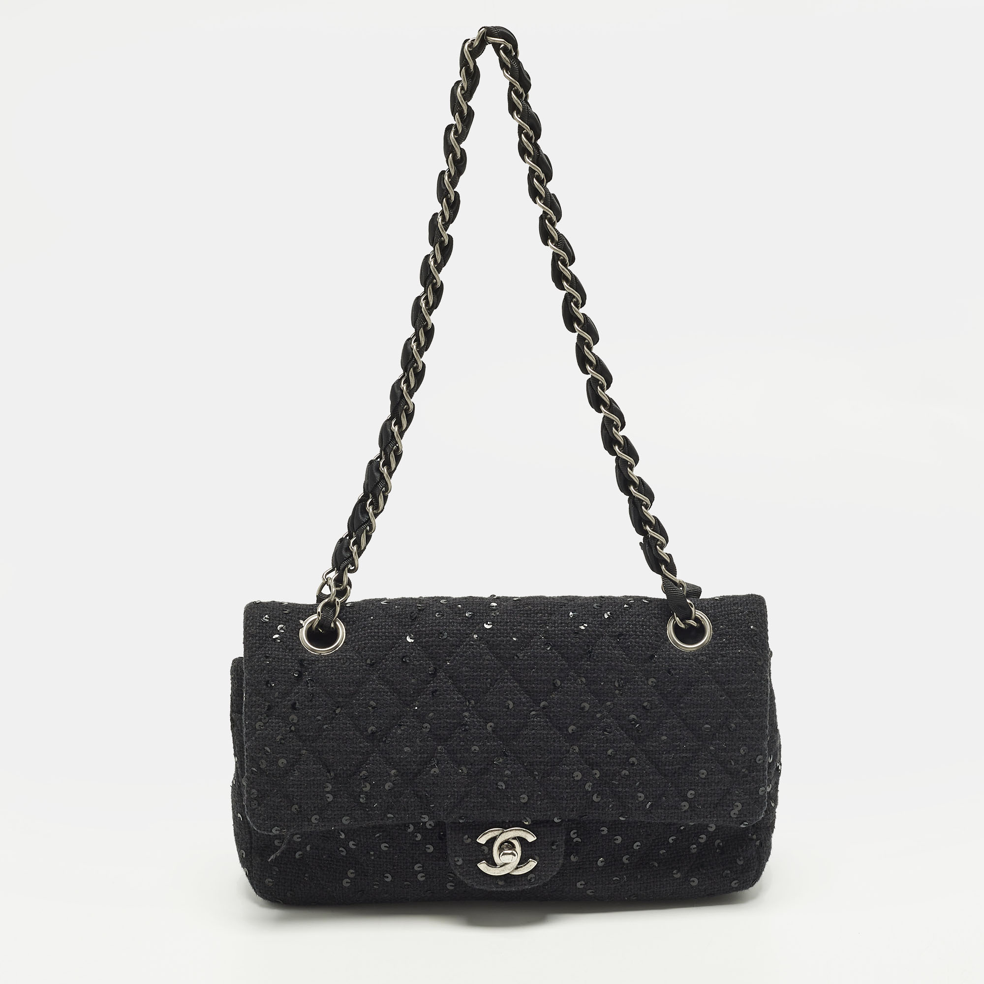 Chanel Classic Double Flap Medium Black Quilted Canvas and Sequins Flap Bag
Chanel Classic Double Flap Medium Black Quilted Canvas and Sequins Flap Bag