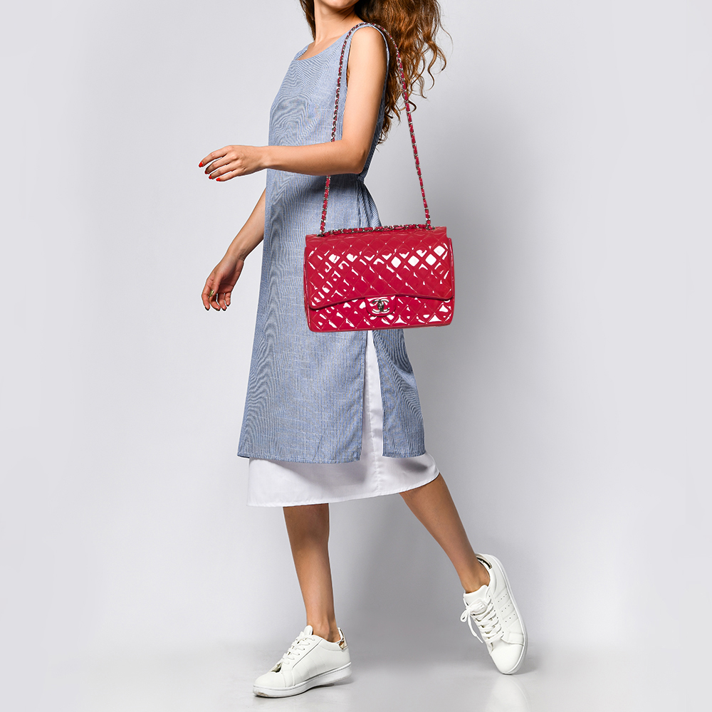 Chanel Fuchsia Quilted Patent Leather Maxi Classic Double Flap Bag, Pink
Chanel Fuchsia Quilted Patent Leather Maxi Classic Double Flap Bag, Pink