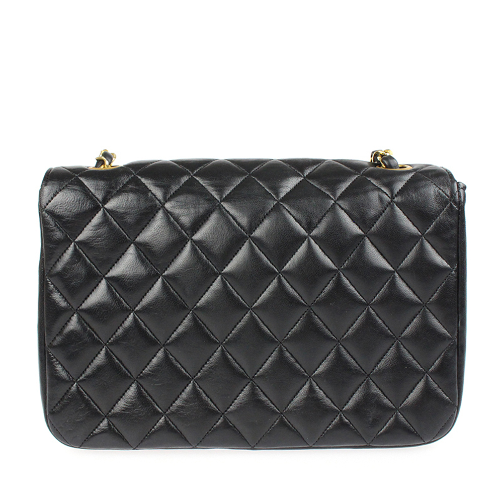 Chanel Black Leather Vintage Single Flap Bag
Chanel Black Leather Vintage Single Flap Bag