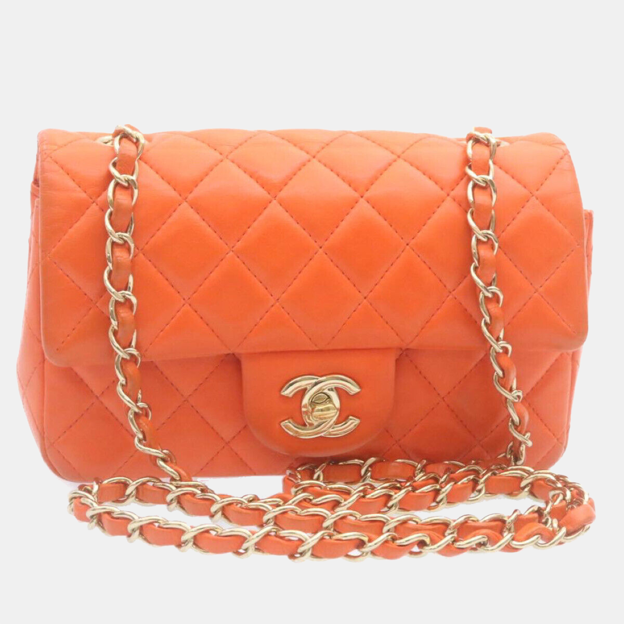 Chanel orange leather mini flap