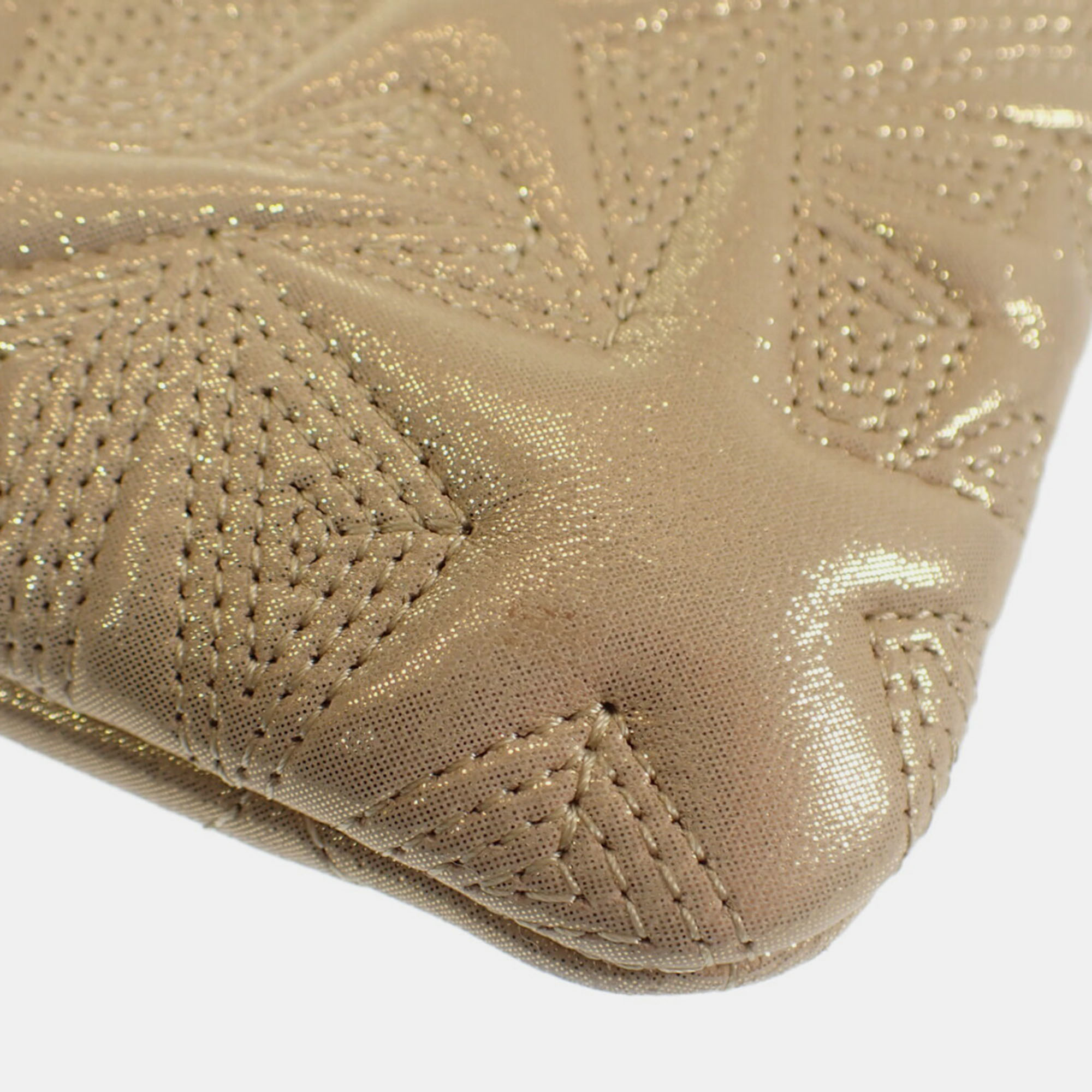 Chanel Gold Embossed Leather O Case Clutch