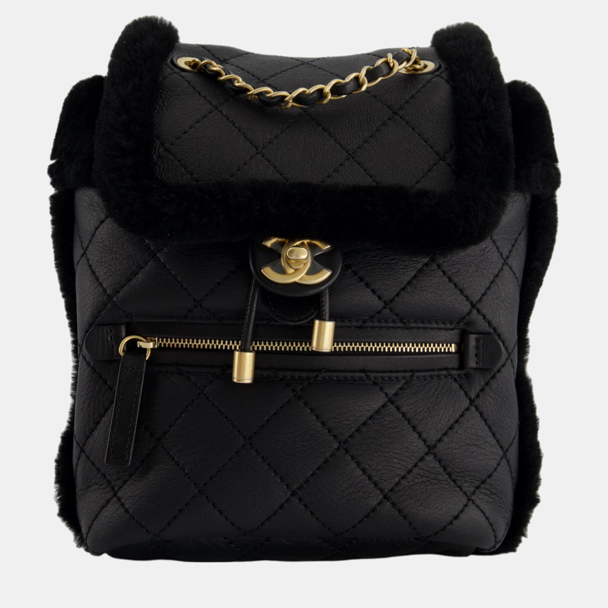 Chanel black calfskin quilted leather and shearling backpack with brushed gold hardware